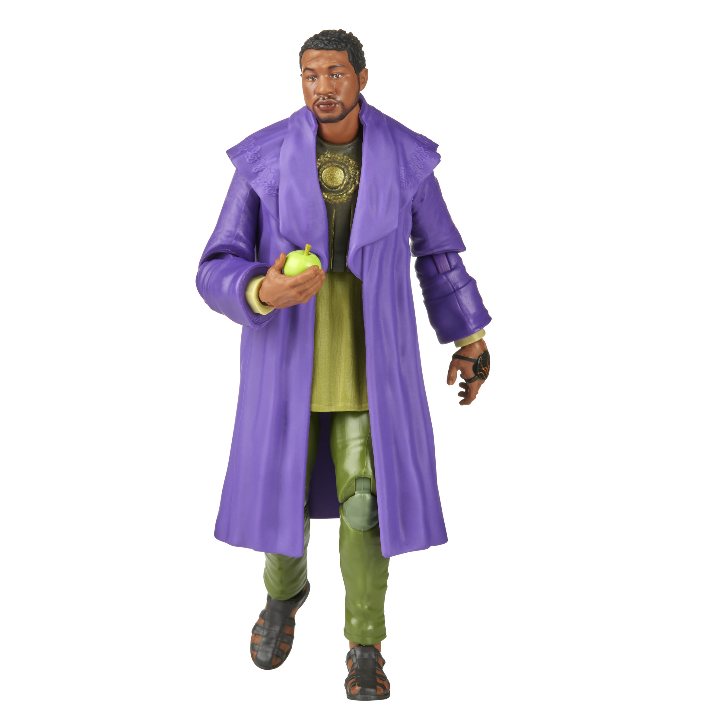 Figura de un hombre con abrigo morado, sosteniendo una manzana.