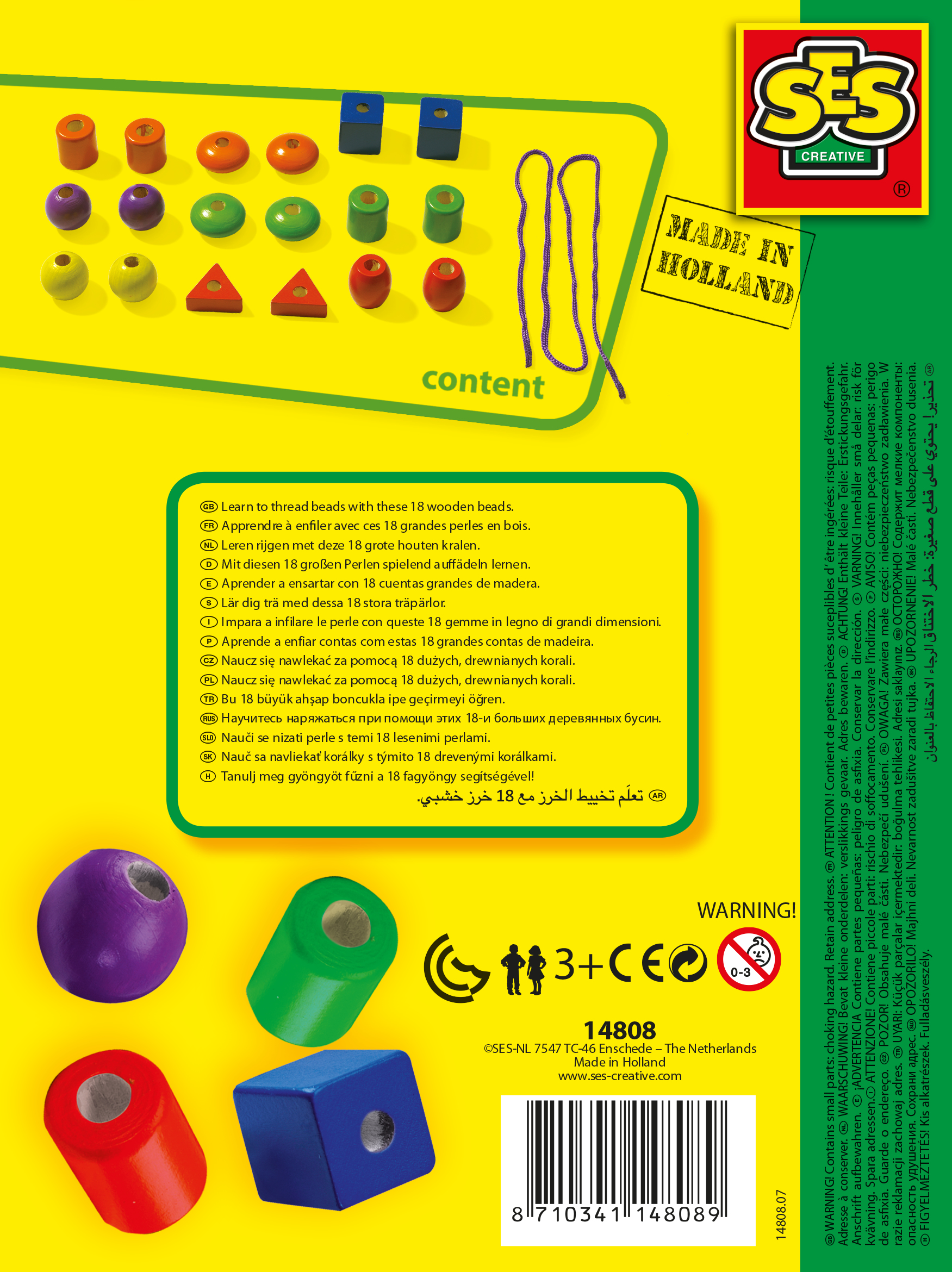 Pudełko z kolorowymi drewnianymi koralikami i uśmiechniętym dzieckiem w naszyjniku z koralików. Wiek 3-6.