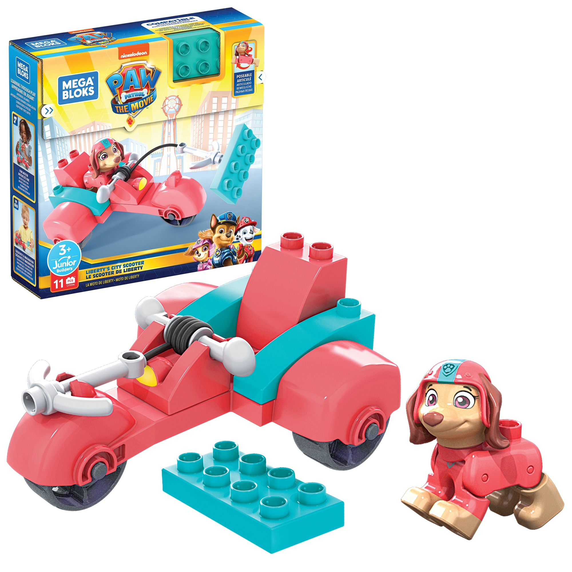 Ensemble de jouets Paw Patrol avec un véhicule rose et une figurine Skye, plus des blocs. Thème de dessin animé.