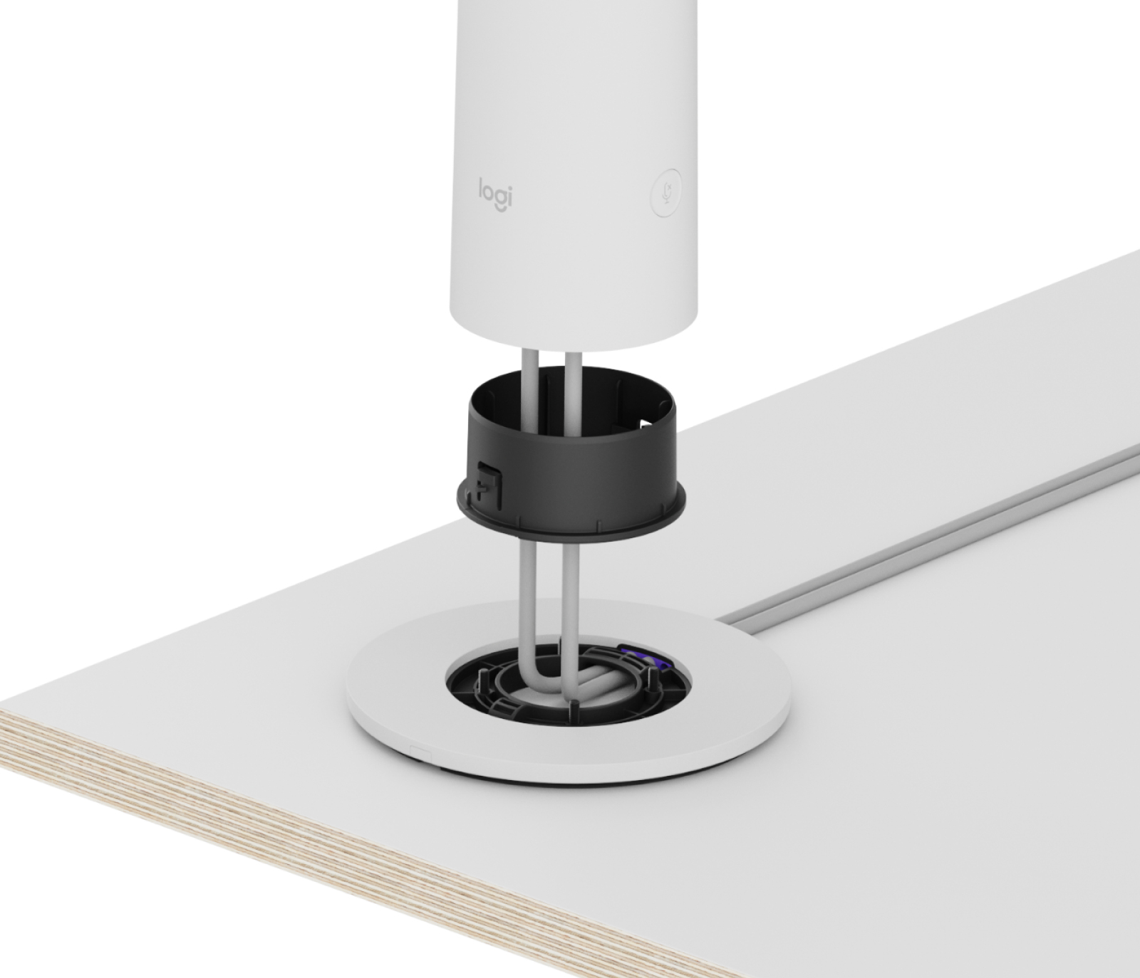Appareil blanc et noir en cours d'installation sur une surface blanche, avec des fils visibles.