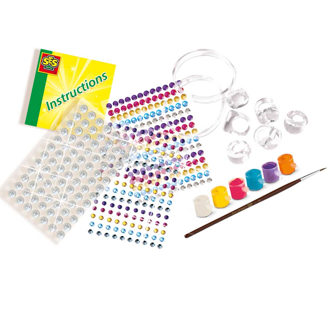Zestaw do biżuterii DIY z naklejkami, kamieniami szlachetnymi, pierścionkami, farbą i pędzlem.