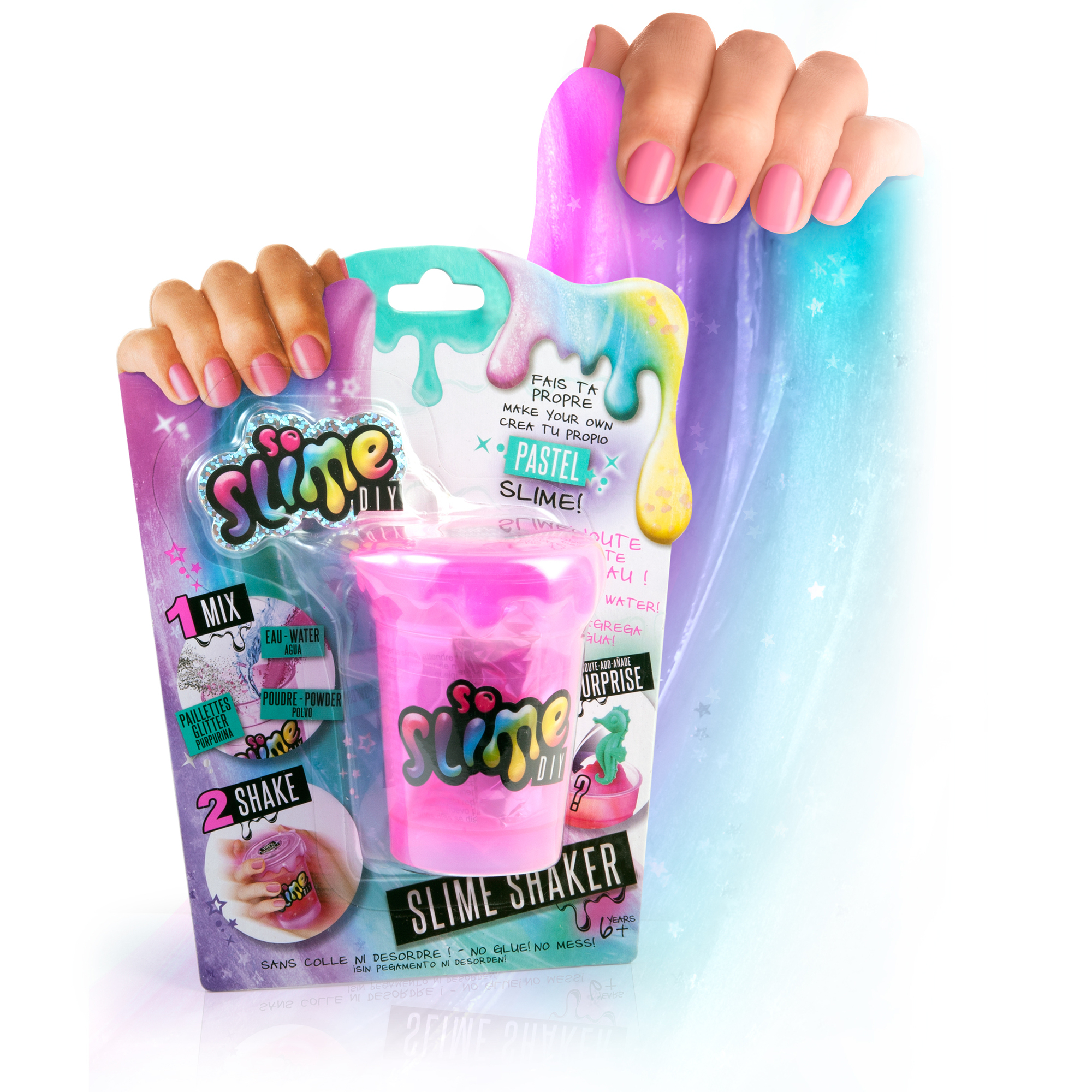 Dłonie trzymające zestaw do majsterkowania Slime. Slime jest różowy, a zestaw ma shaker i instrukcje.