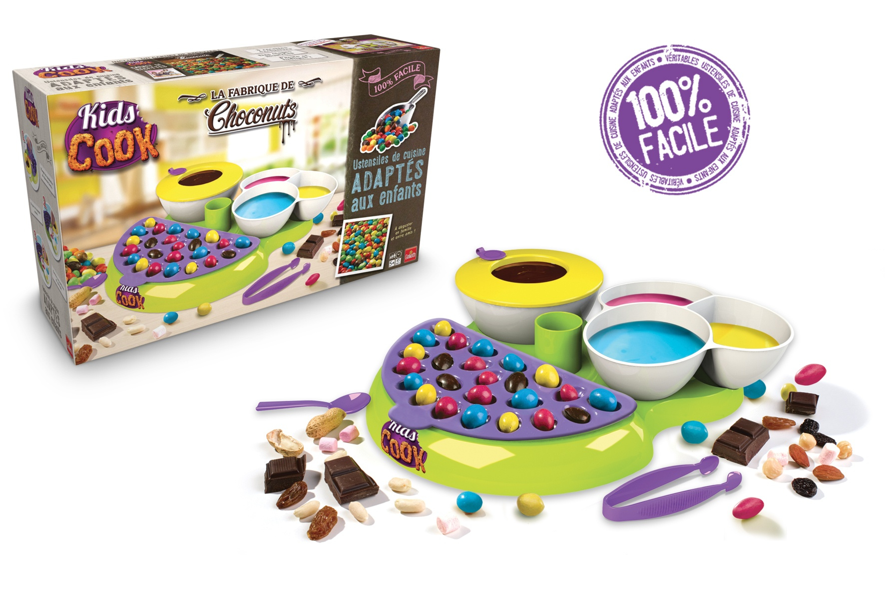 Zestaw Kids Cook z kolorowymi cukierkami, czekoladą i narzędziami do robienia smakołyków. Pudełko pokazuje gotowy produkt.