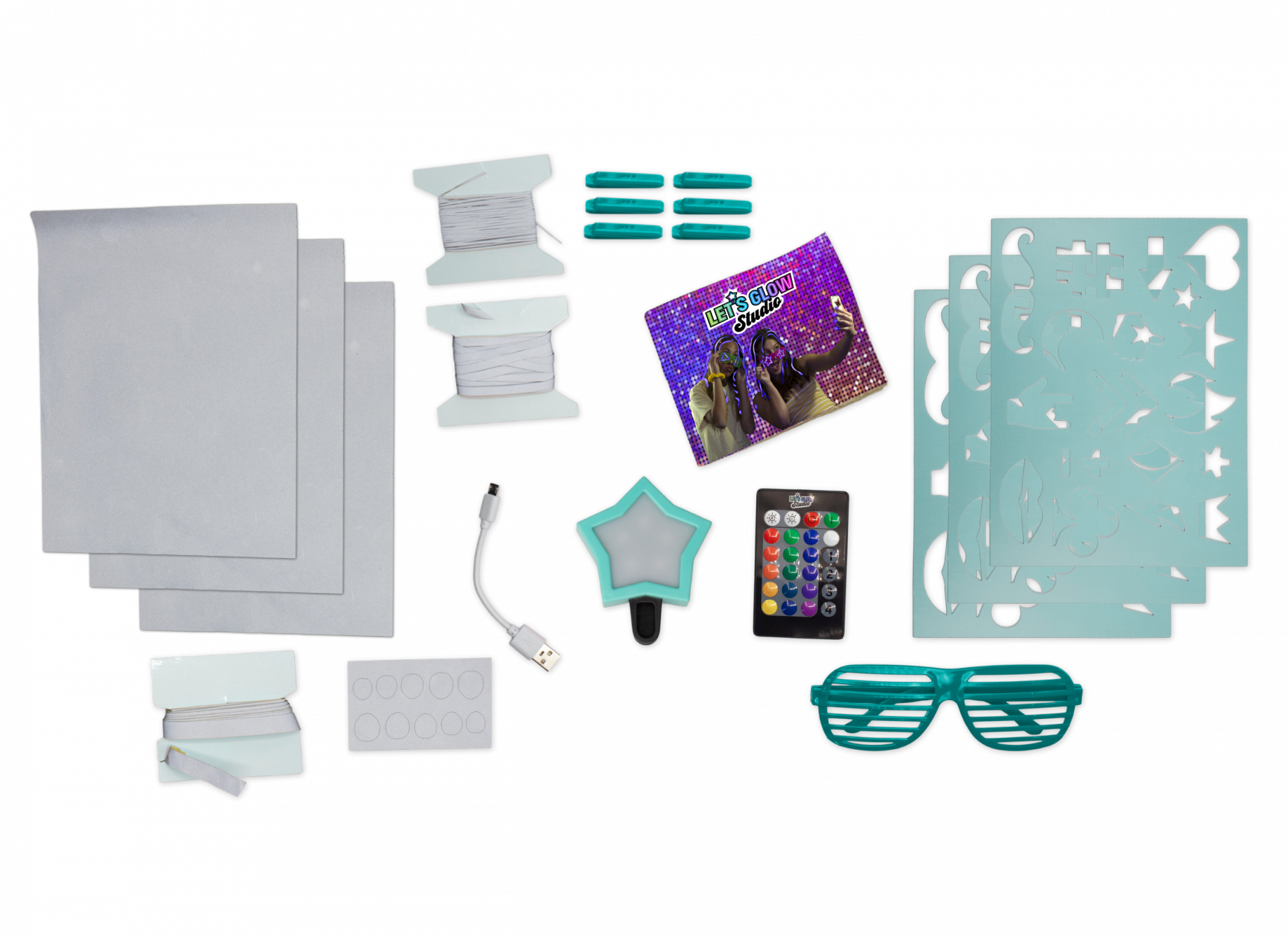 Zestaw do majsterkowania z świecącą gwiazdą, szablonami, okularami, sznurkami, pilotem i akcesoriami.
