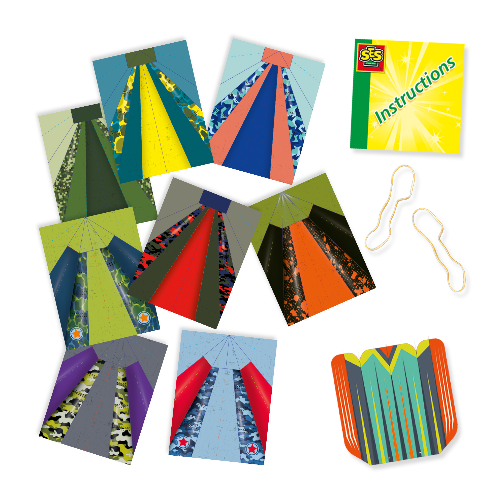 Zestaw do majsterkowania z papierem w kształcie samolotu, instrukcją i dwoma złotymi spinaczami.