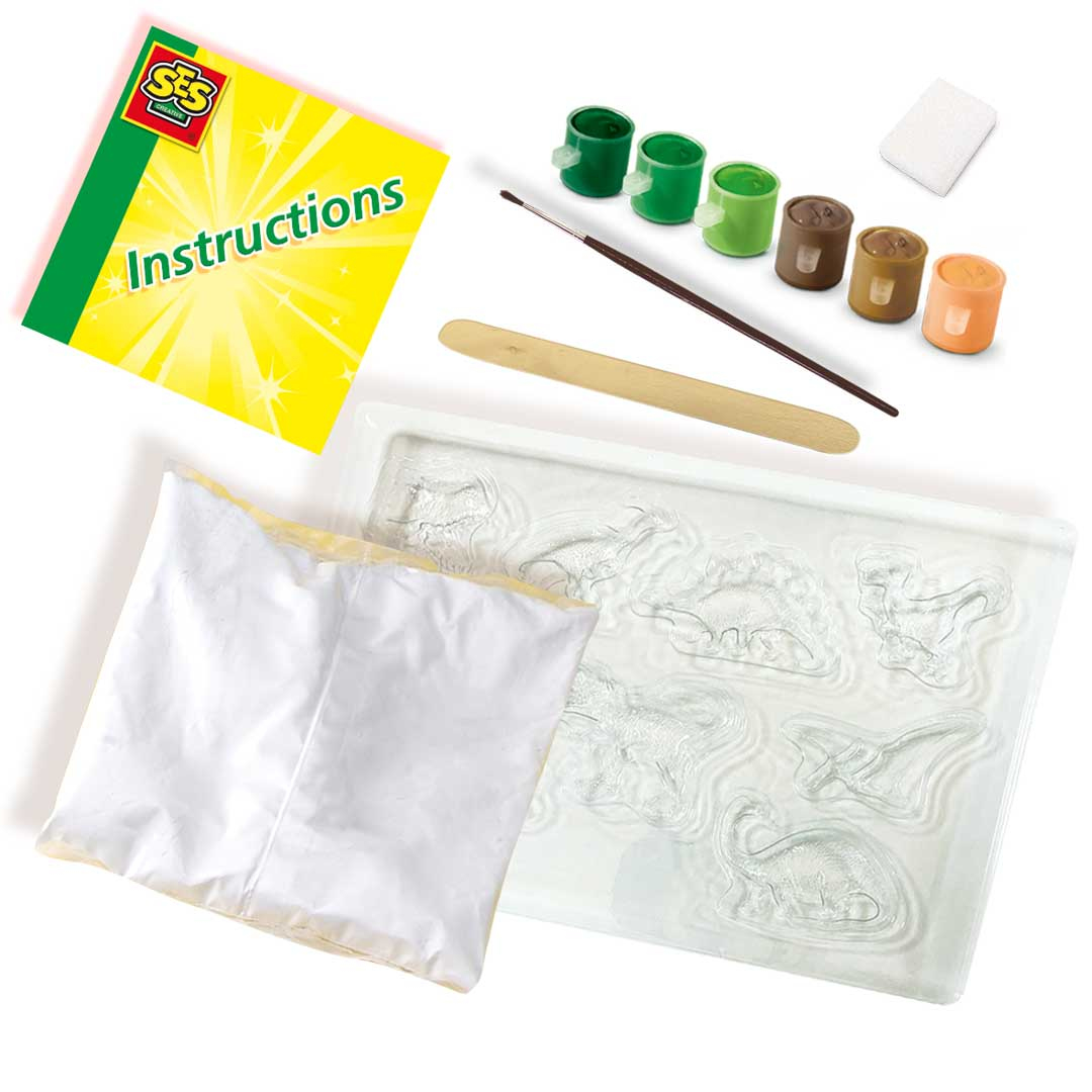 Zestaw rzemieślniczy z dinozaurami z instrukcjami, farbą i formami. Białe tło.