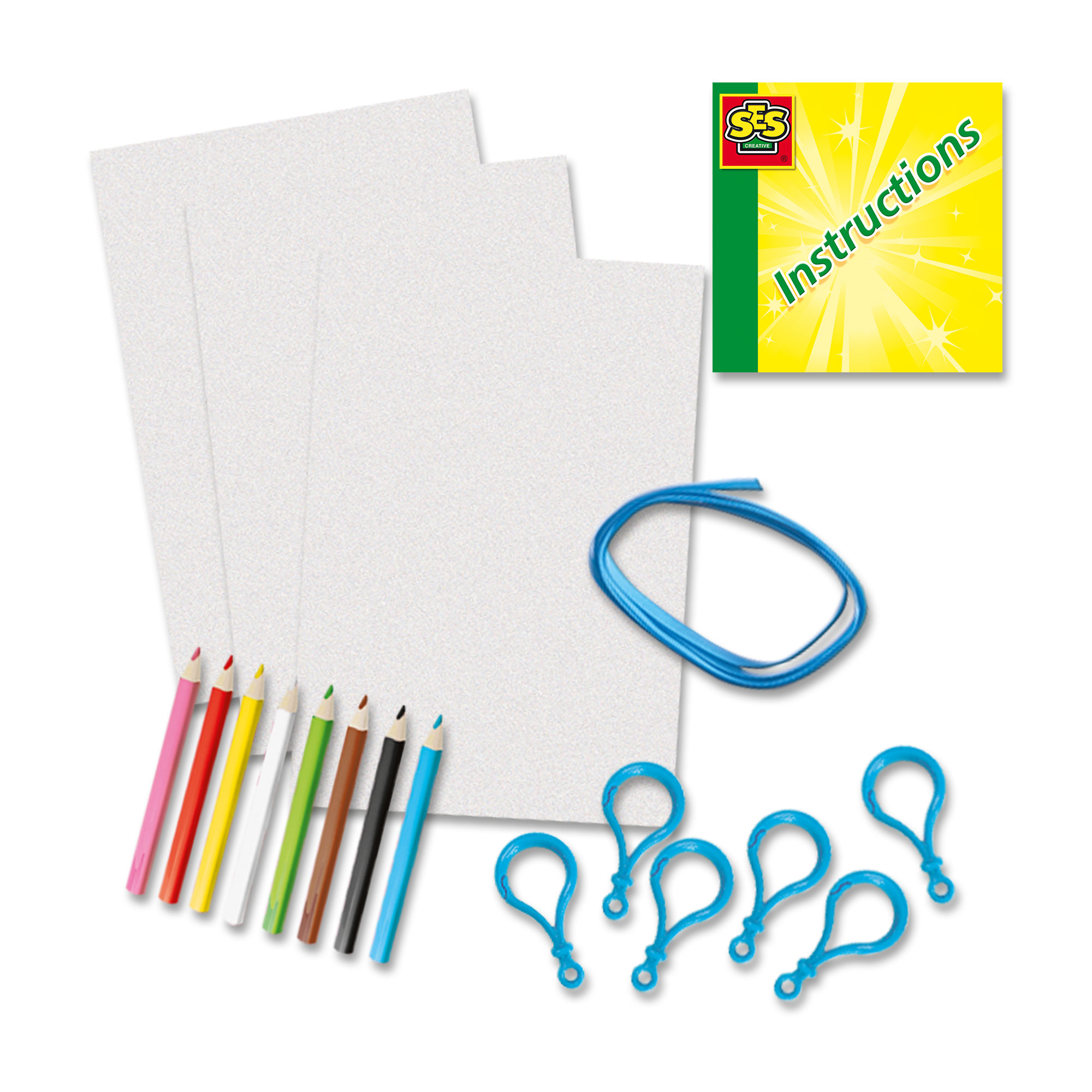 Materiały do rękodzieła. Biały papier, kredki, niebieskie pętle i broszura.