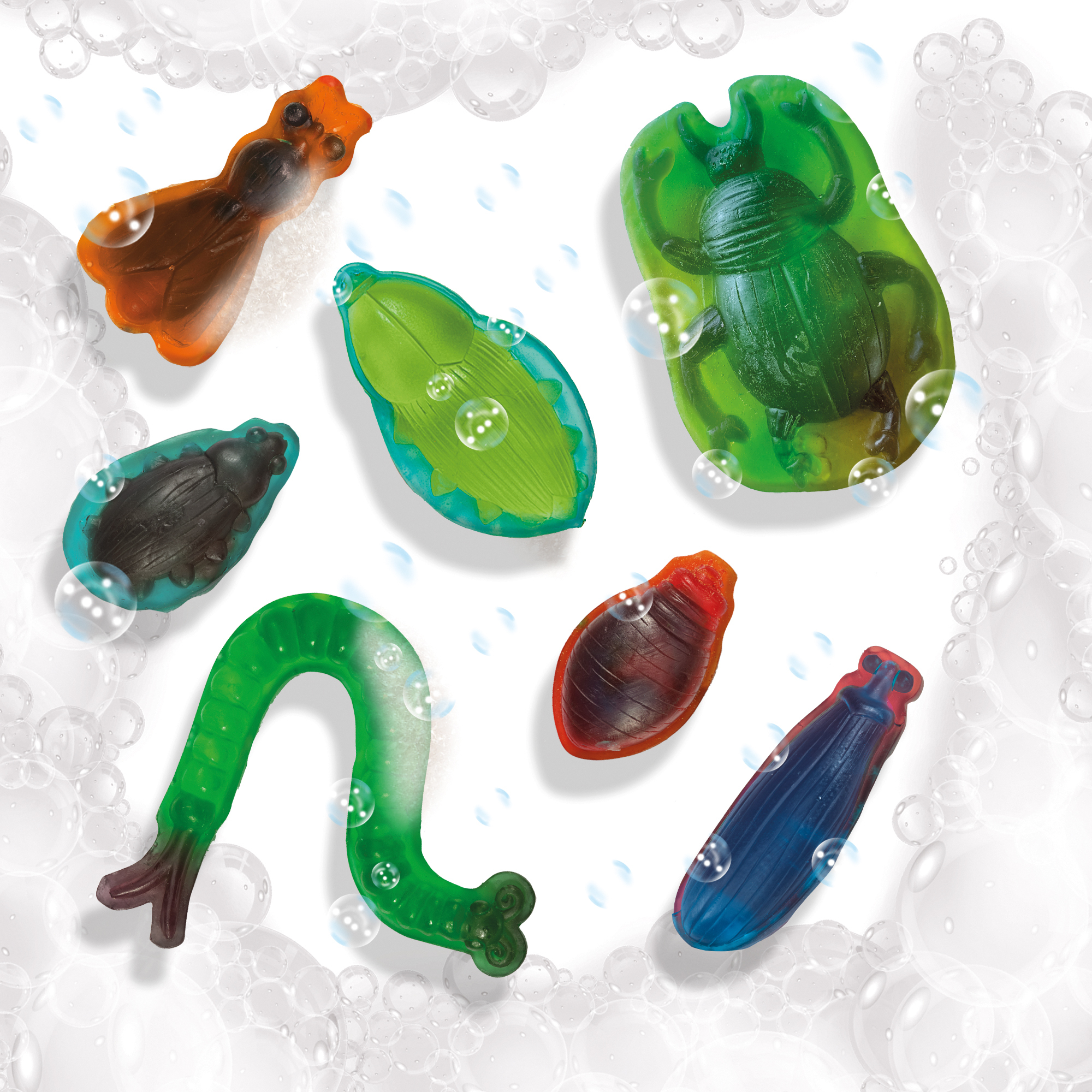 Mydła w kształcie owadów w wodzie wypełnionej bąbelkami. Mydła mają różne kolory.