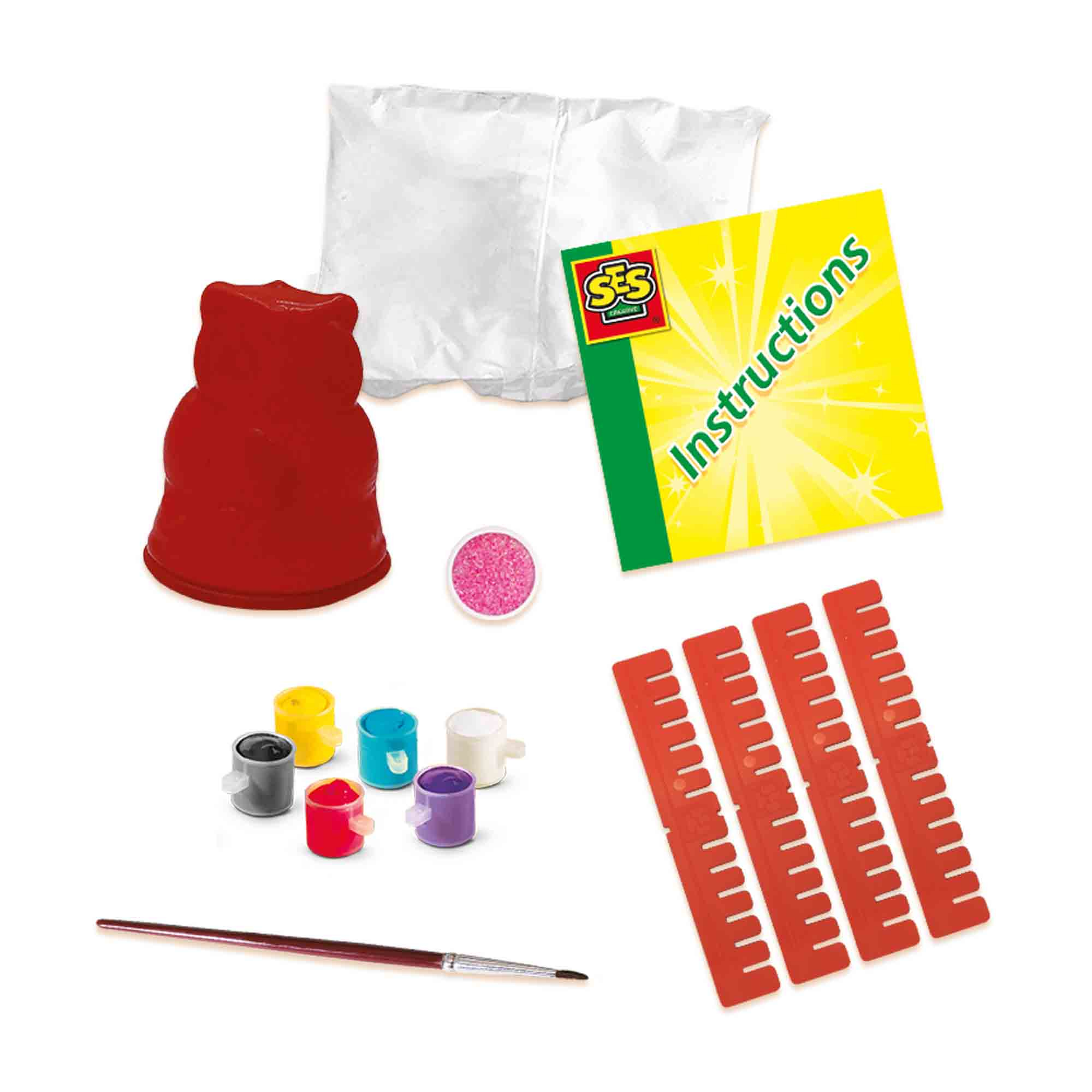 Zestaw rzemieślniczy z czerwoną formą, farbą, pędzlami i instrukcjami.