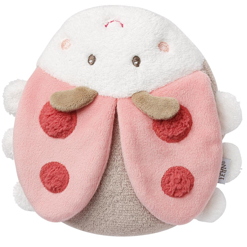 Pluszowa biedronka z różowymi, czerwonokropkowanymi skrzydłami i białą głową. Na białym tle.