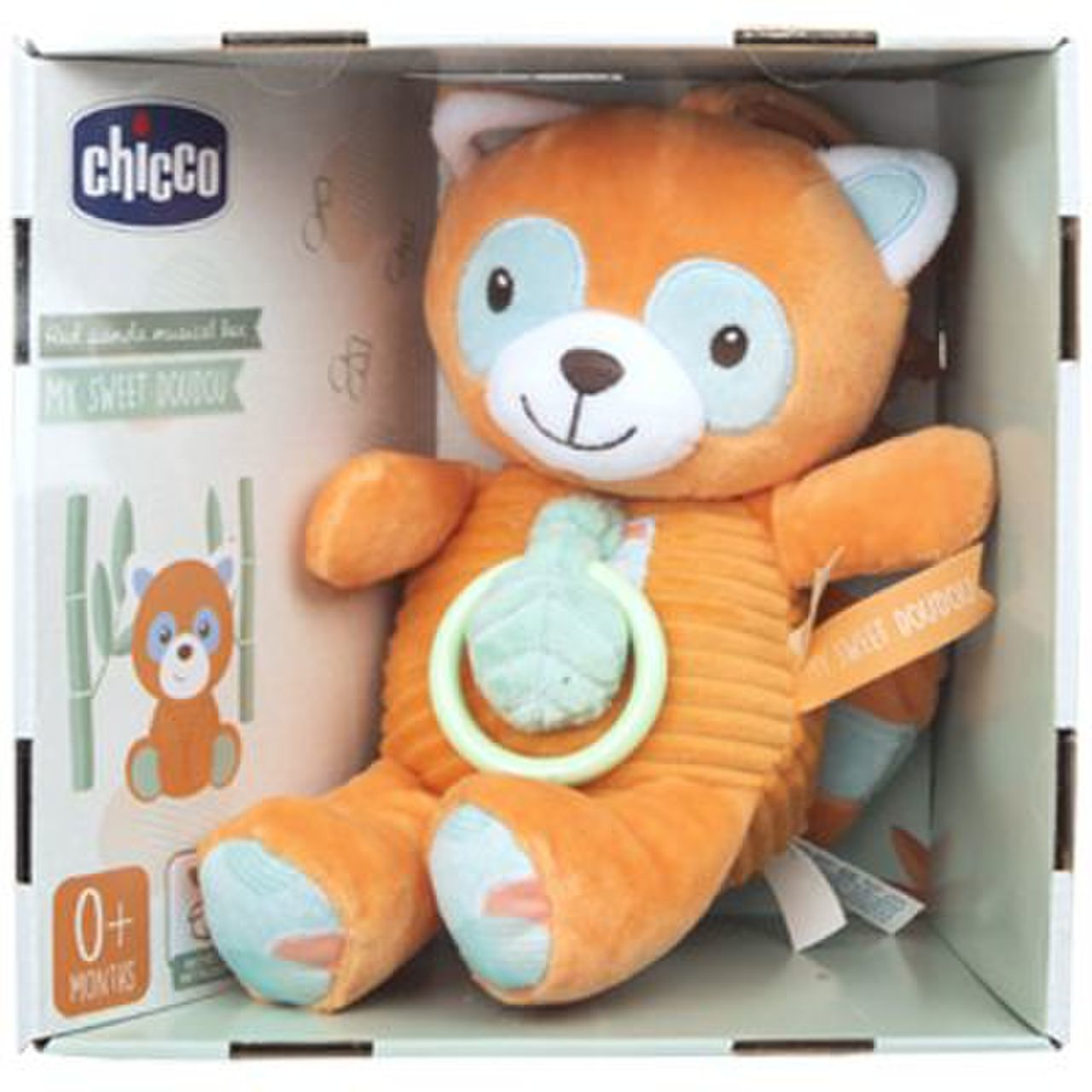 Ein orangefarbenes Teddybär-Spielzeug in einer Box.