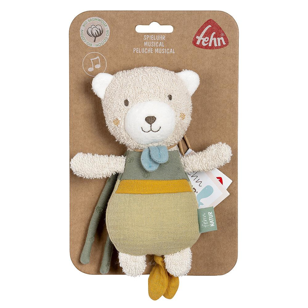 Un giocattolo a forma di orso musicale su una carta con una nota musicale.