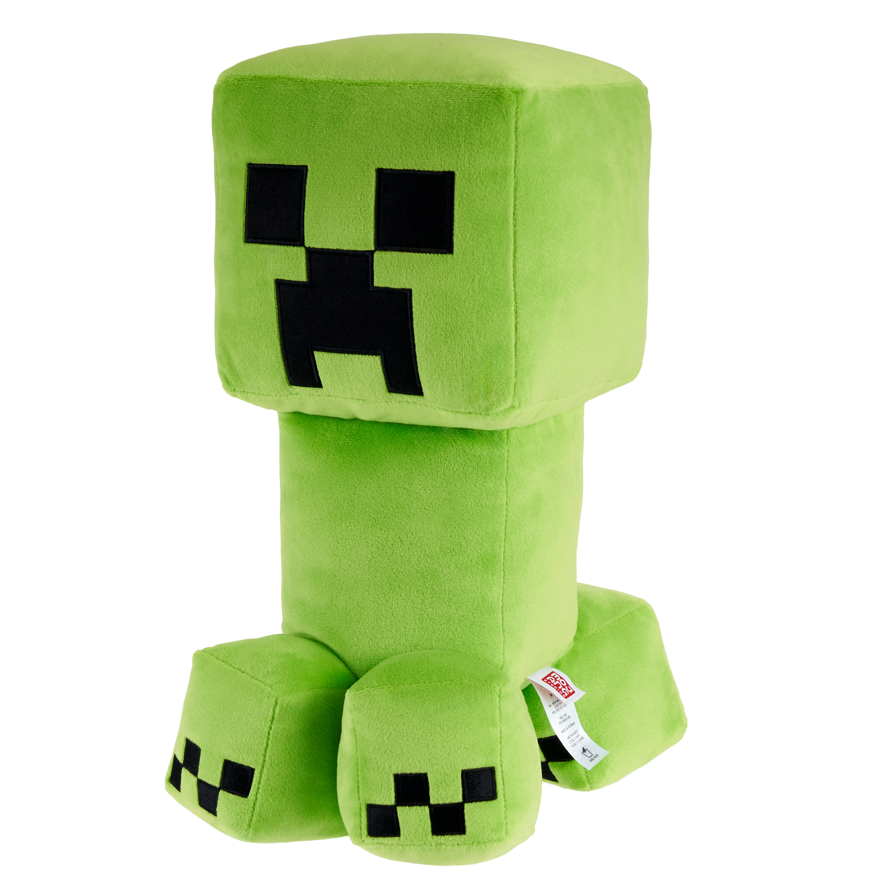 Peluche verde di Creeper di Minecraft, occhi e bocca quadrati neri, piedi neri, sfondo bianco.