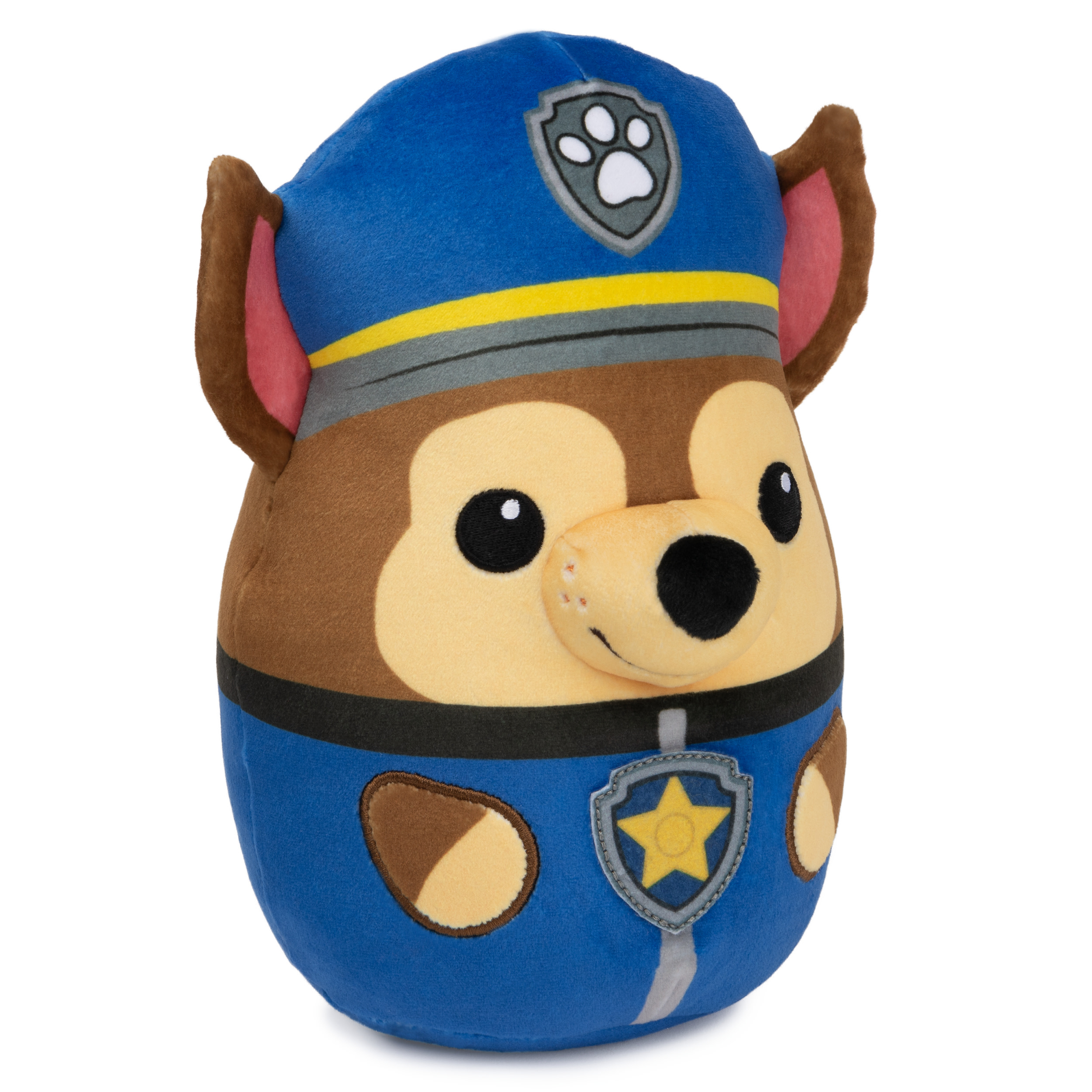 Un peluche di Chase (Paw Patrol) in uniforme da poliziotto, rivolto in avanti.