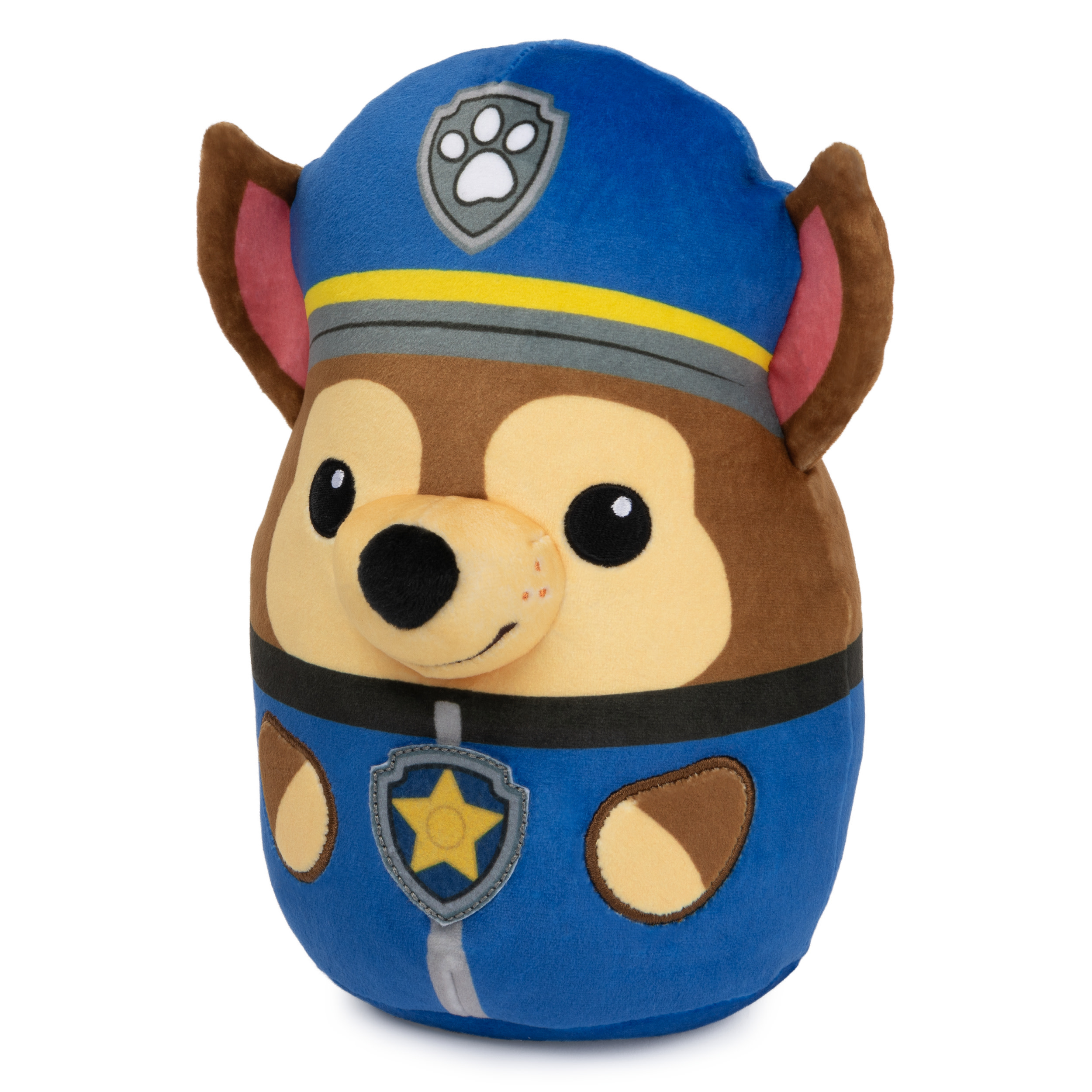 Un peluche di Chase di Paw Patrol con un'uniforme da poliziotto. Il giocattolo è in posa seduta.