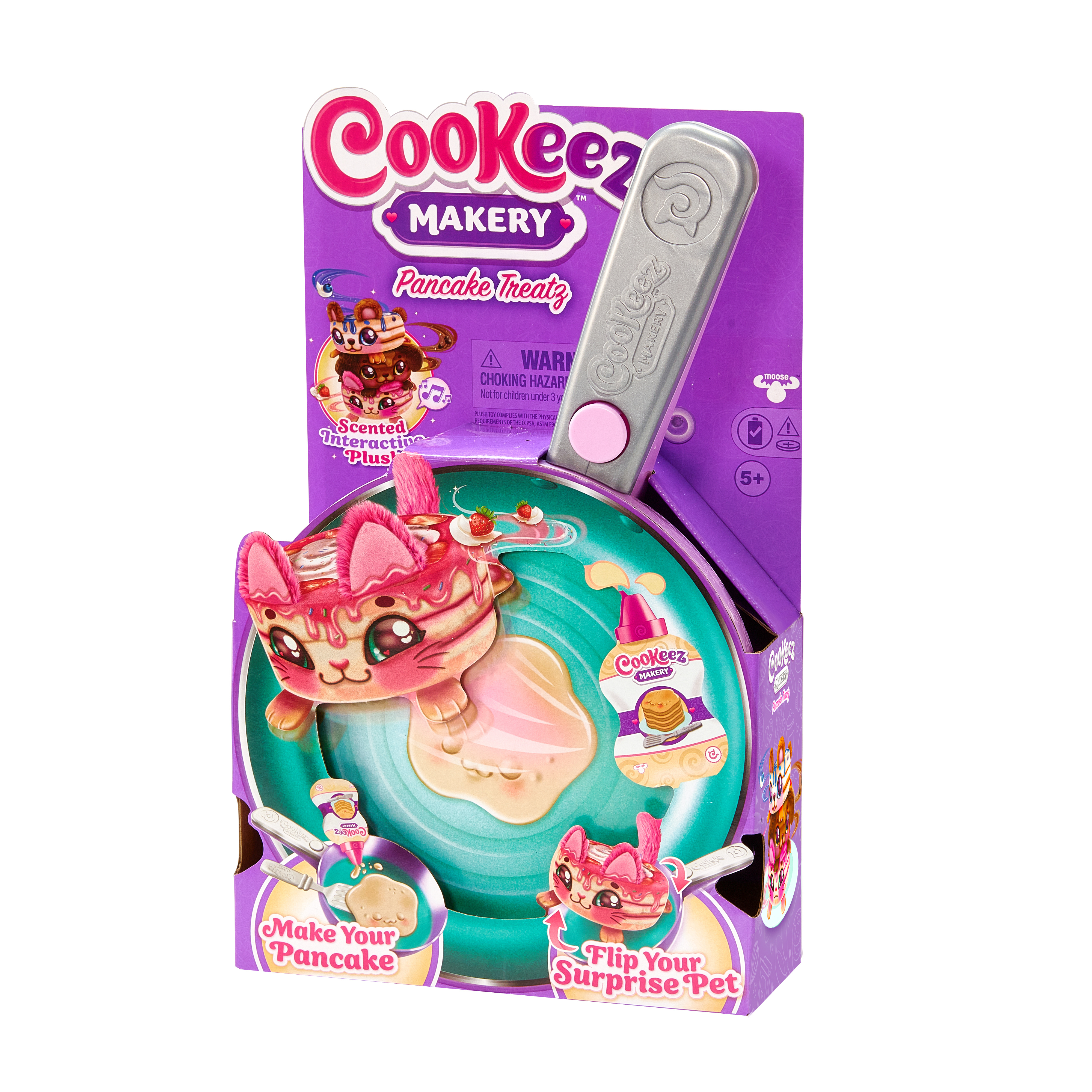 Zestaw zabawek w pudełku z zabawką naleśnikiem na patelni.