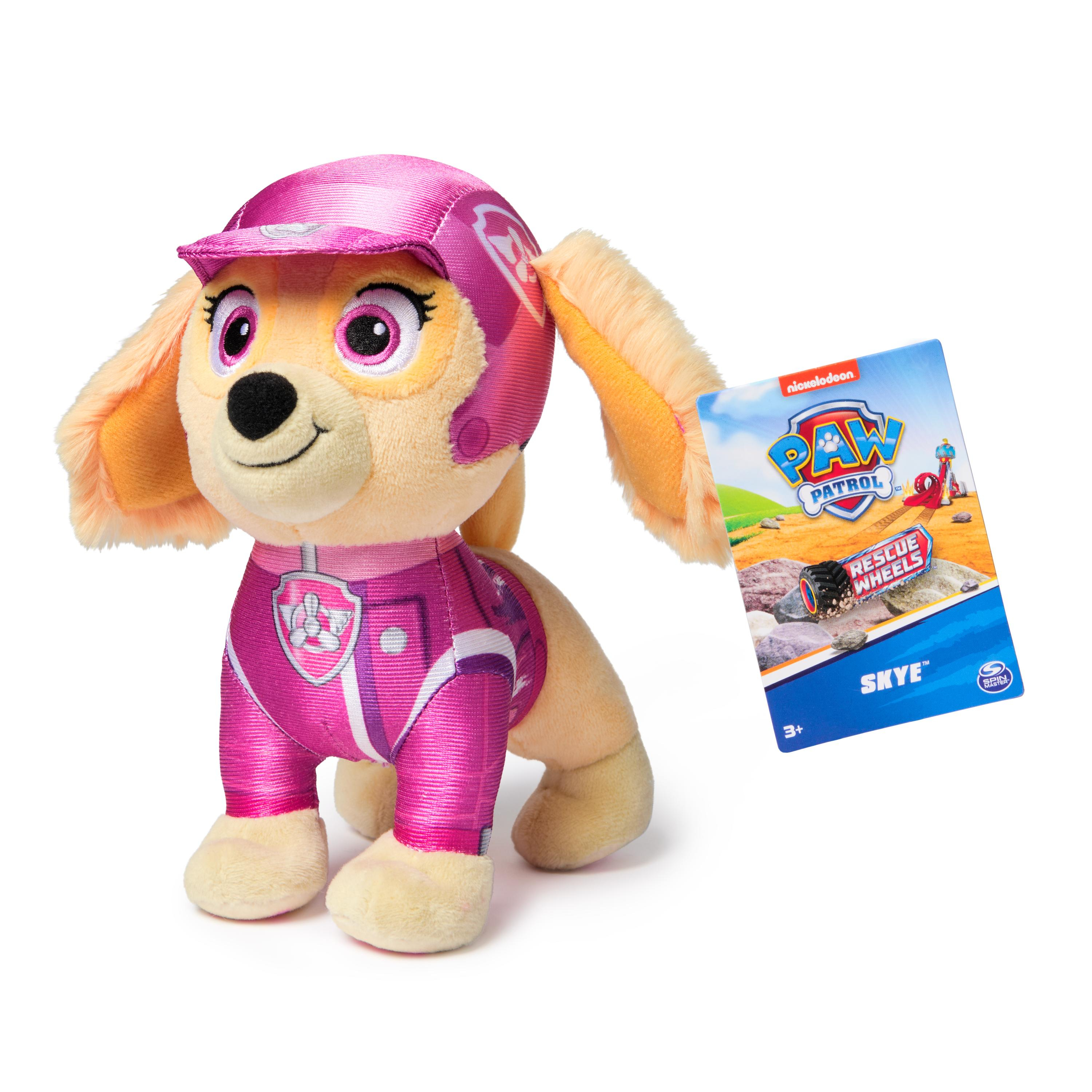 Skye vom PAW Patrol-Plüschtier, trägt einen rosa Helm und Outfit, mit einem angebrachten Etikett.