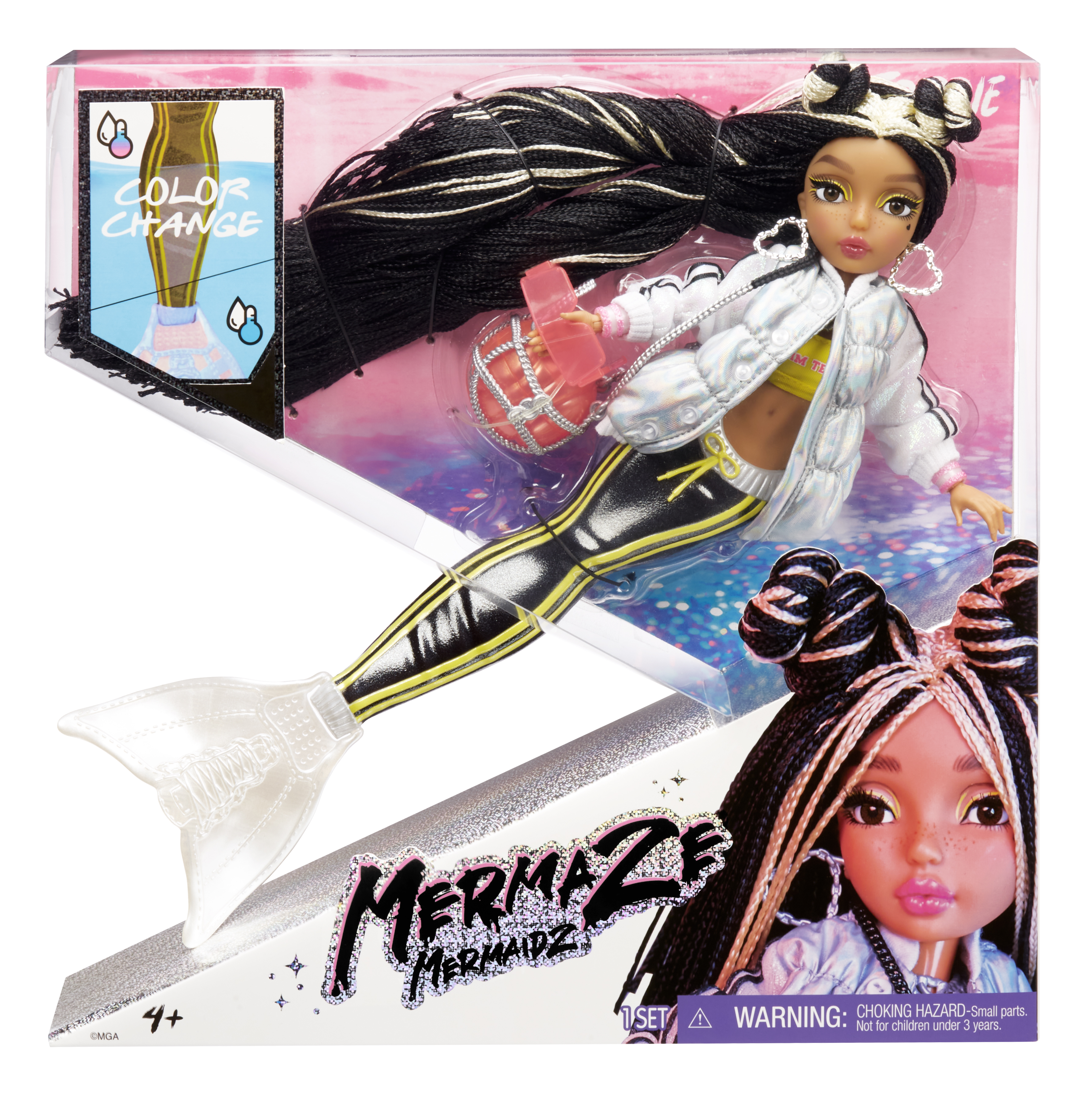 Muñeca sirena en una caja. Cabello negro y dorado, chaqueta blanca y cola de sirena.