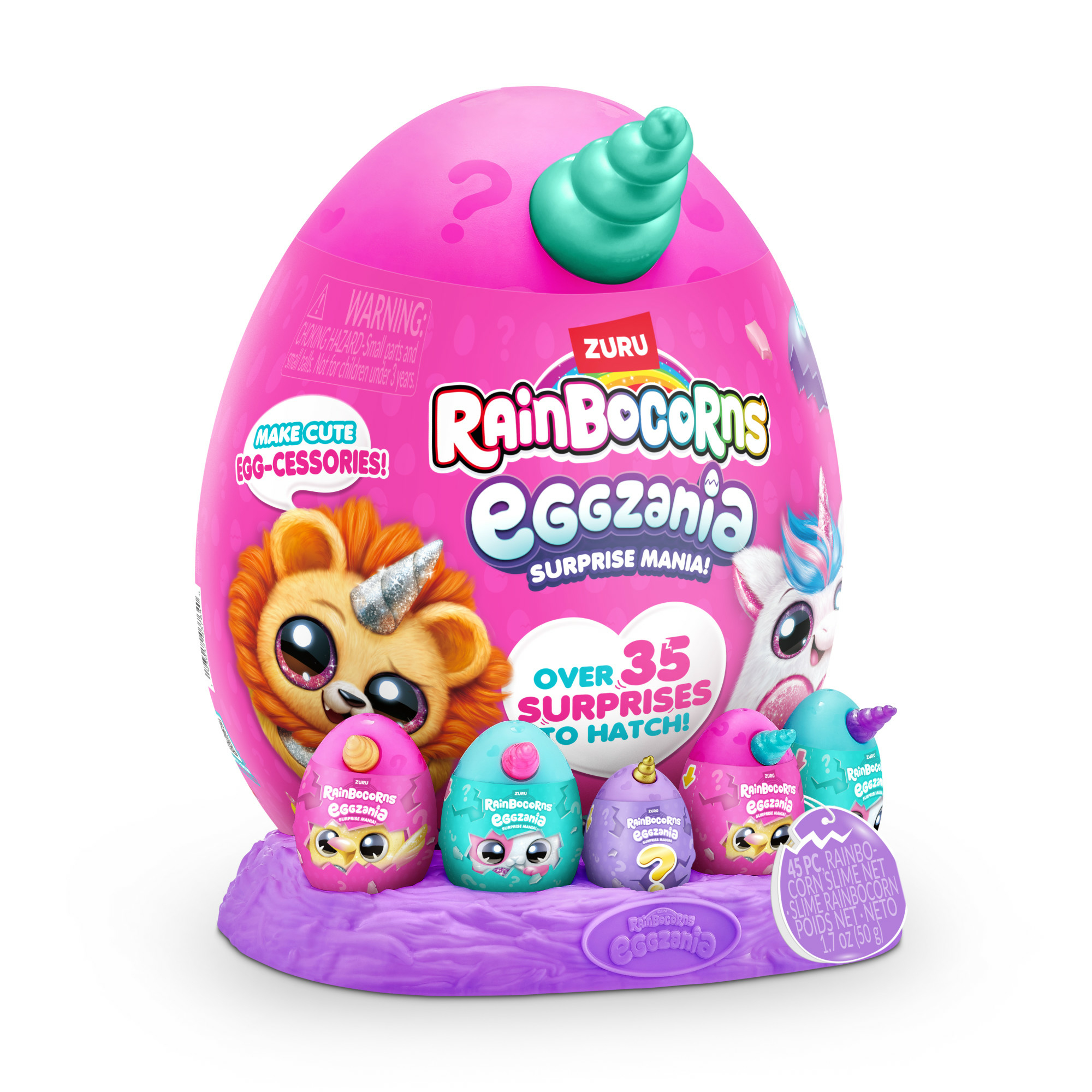 Un gruppo di giocattoli Rainbocorns Eggzania. Un grande uovo rosa e uova più piccole su una base viola.