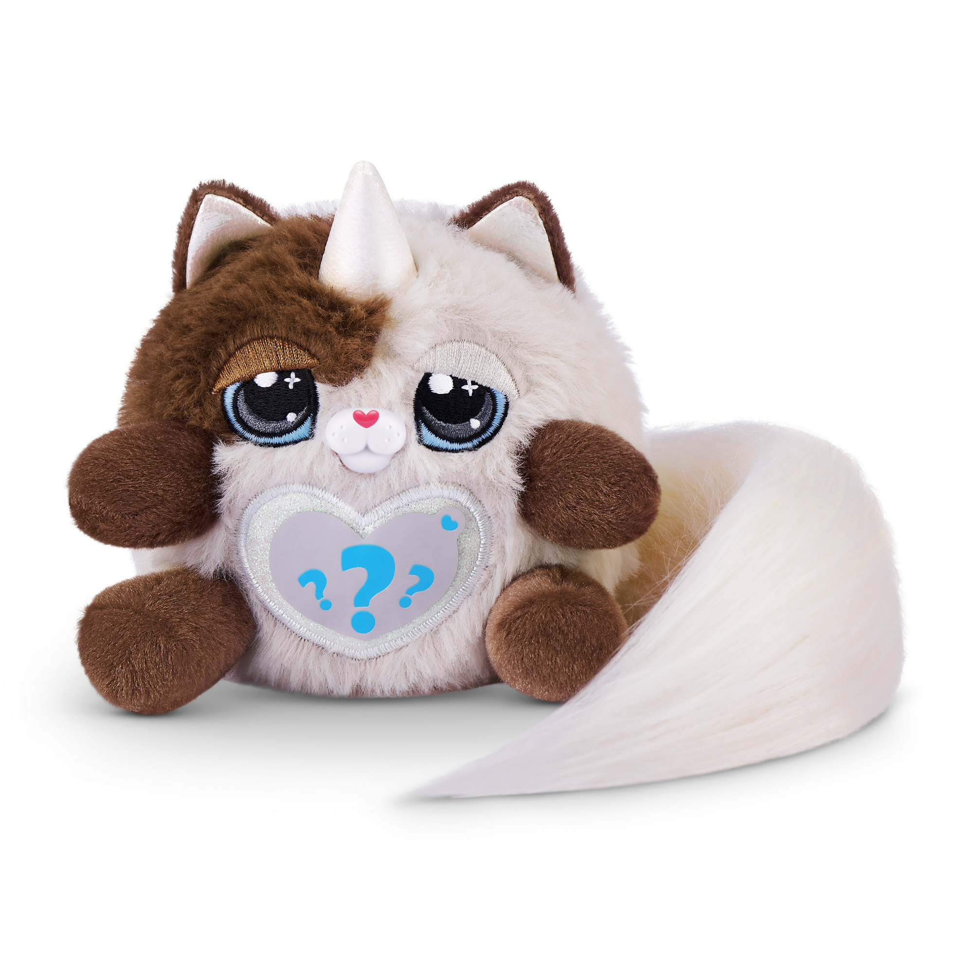Un peluche gatto-unicorno, marrone e bianco, con un corno di unicorno e un cuore sulla pancia.