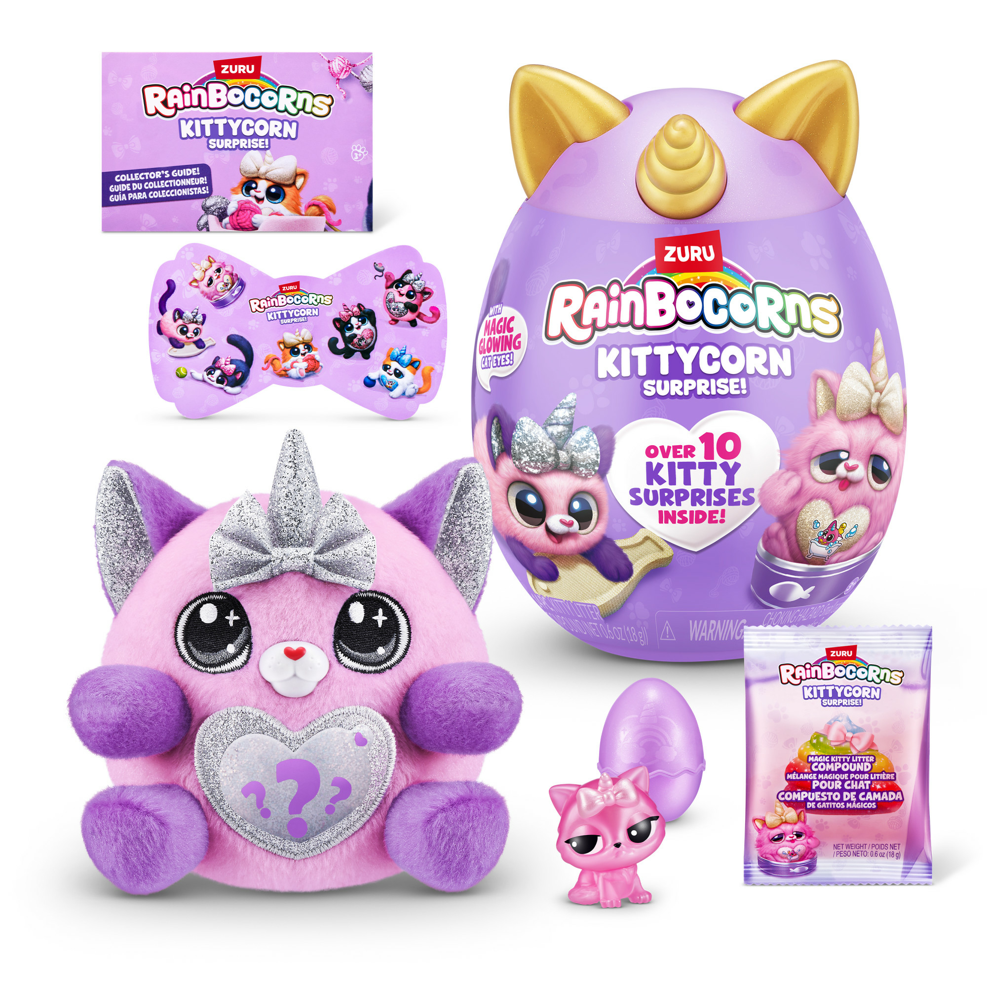 Ein pinkes Kittycorn Überraschungsspielzeug mit Zubehör, darunter ein Ei, ein kleines Spielzeug und ein Führer.