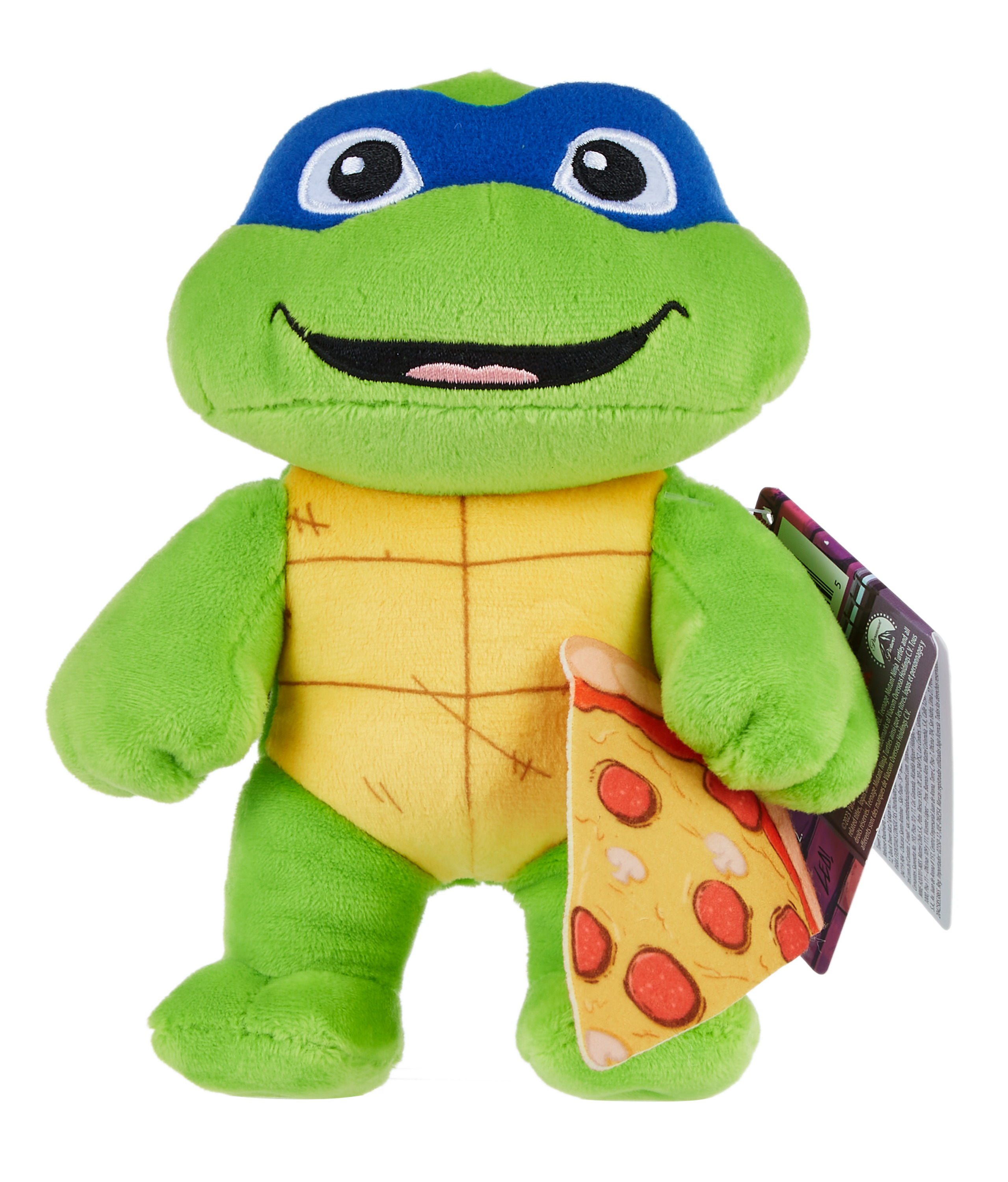 Ein Plüsch-Teenage Mutant Ninja Turtle, Leonardo, der ein Pizzastück hält. Gelber Panzer, grünes Gesicht.