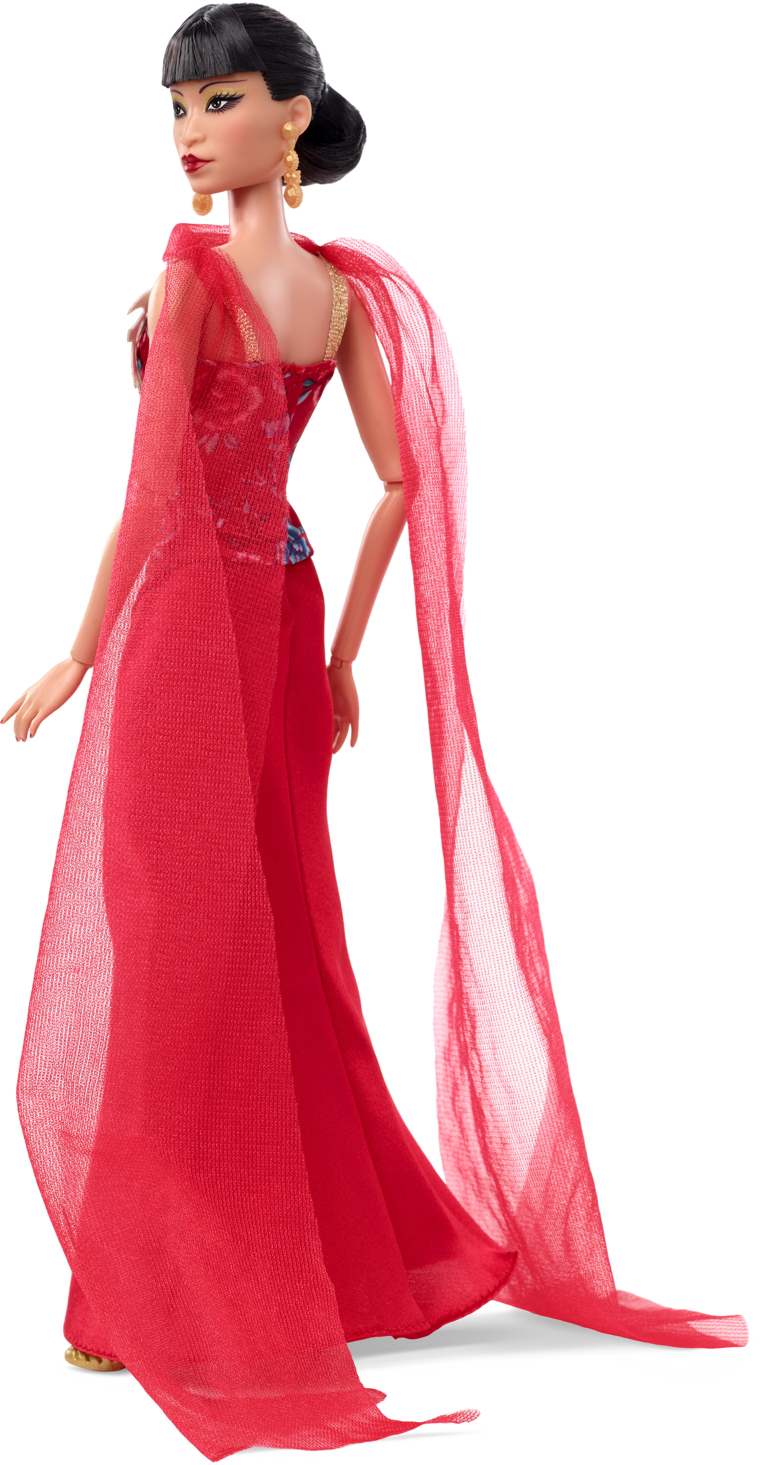 Azjatycka lalka Barbie w czerwonej sukni z długim trenem i ciemnymi włosami, na białym tle.