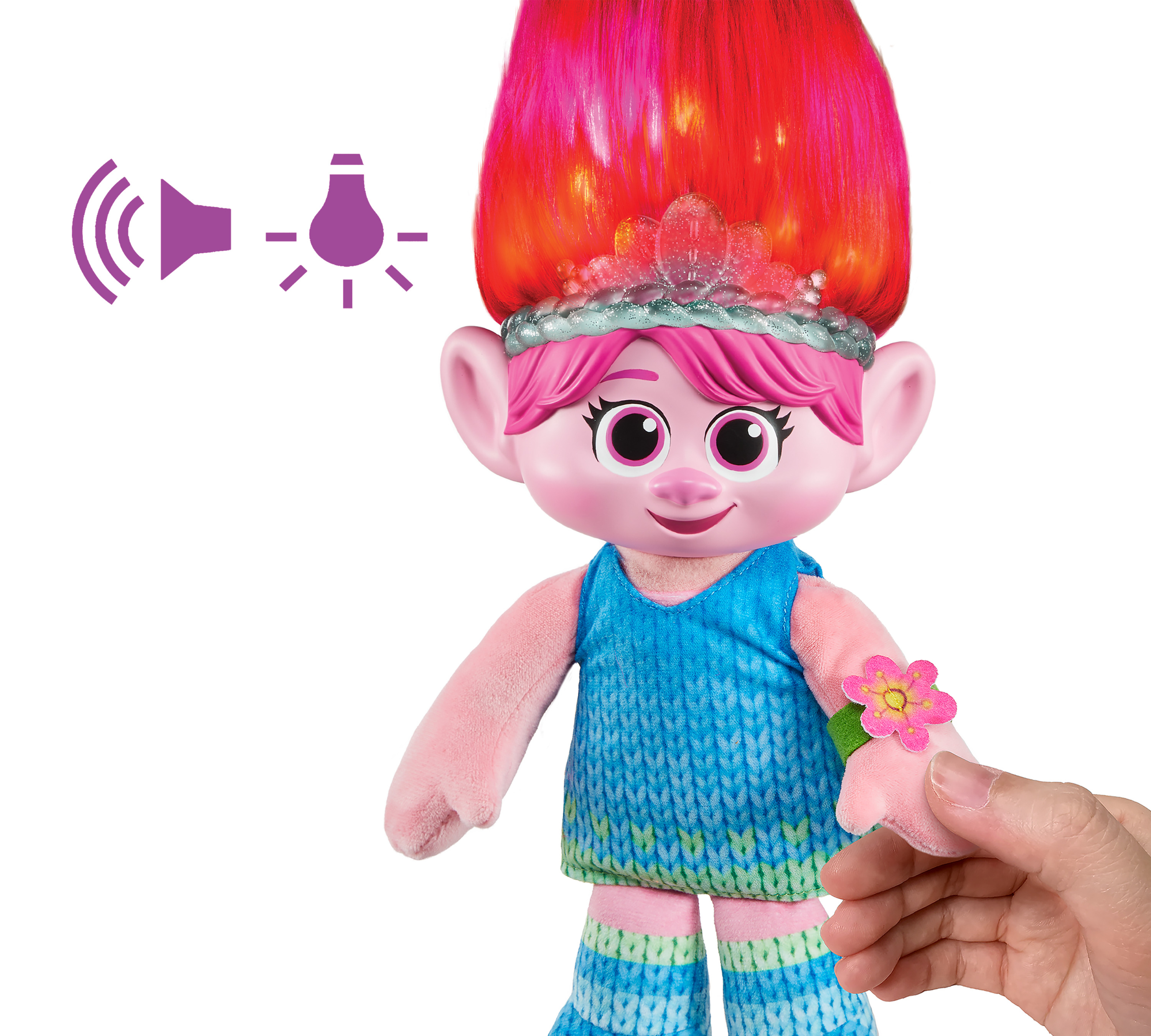Puppe mit rosa Haaren und Krone, mit Ton- und Lichtsymbol. Szene: Troll-Puppe mit Licht- und Tonfunktionen.
