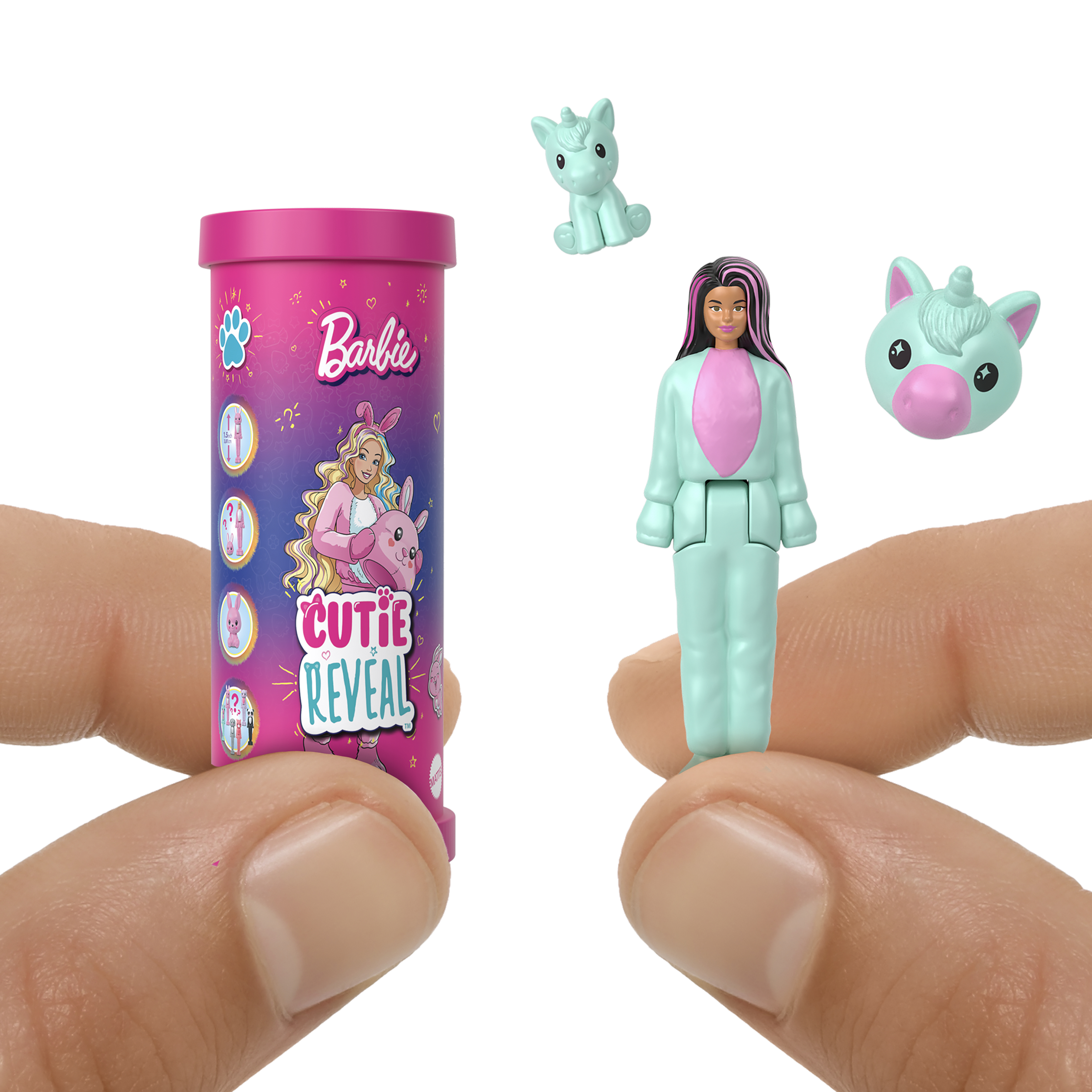 Miniatur-Barbie Cutie Reveal-Puppe mit Zubehör. Die Puppe trägt ein rosa-blaues Outfit. Das Zubehör umfasst: