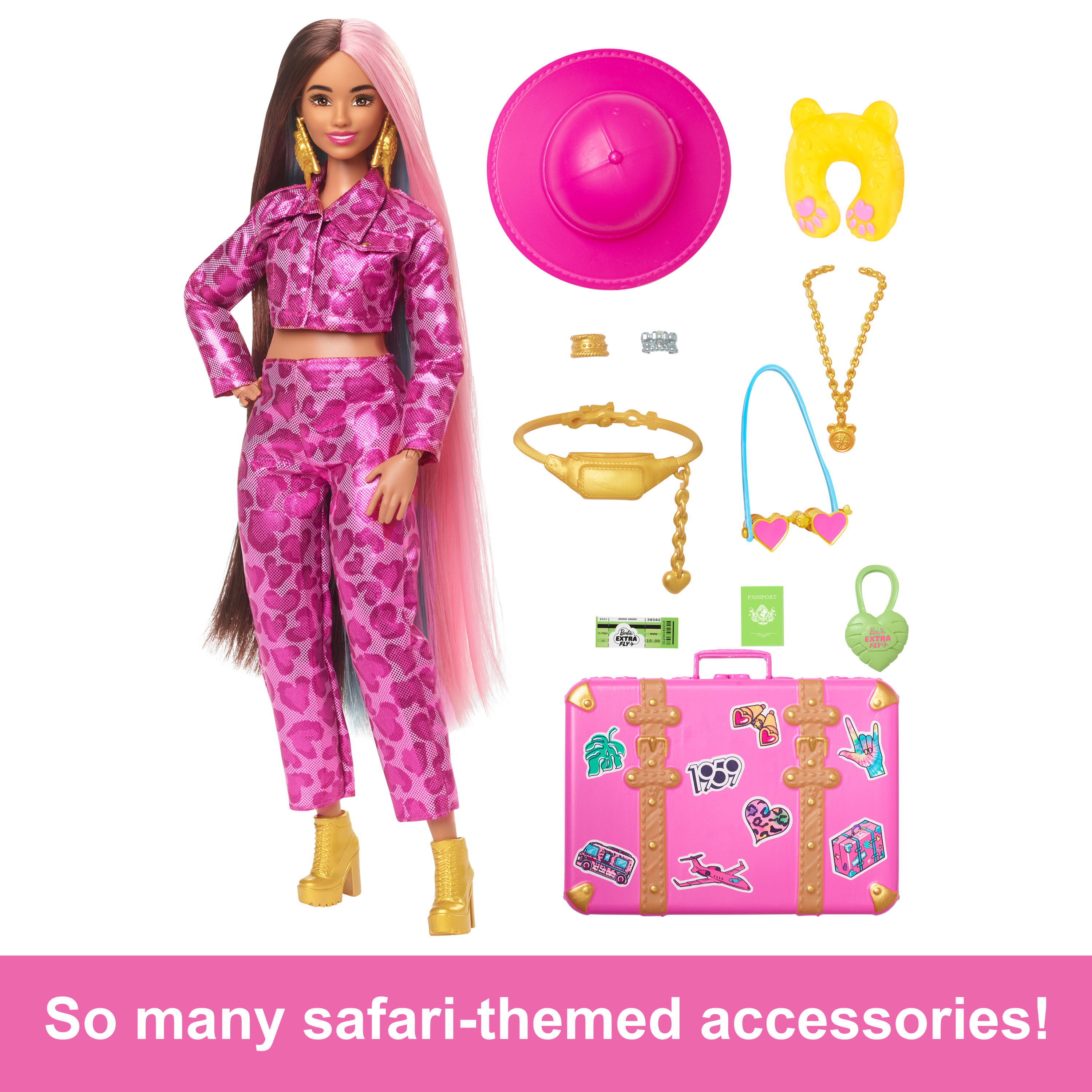 Barbie-Puppe mit langen, rosa Haaren, Safari-Kleidung und Accessoires. Ein rosa Koffer in der Nähe.