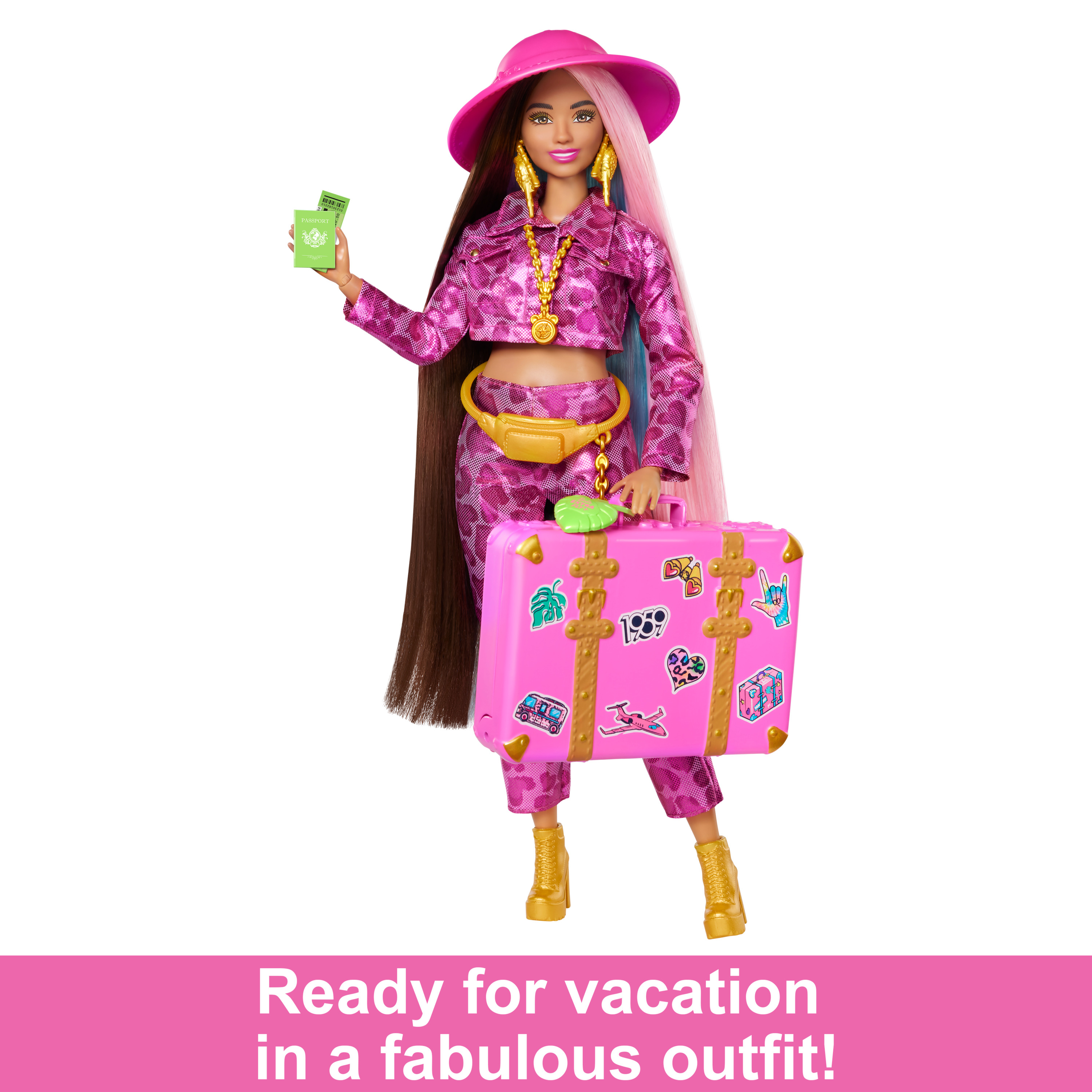 Eine Puppe mit langem Haar, einem rosa Outfit, einem Hut und einem Koffer. Text: 'Urlaub!'
