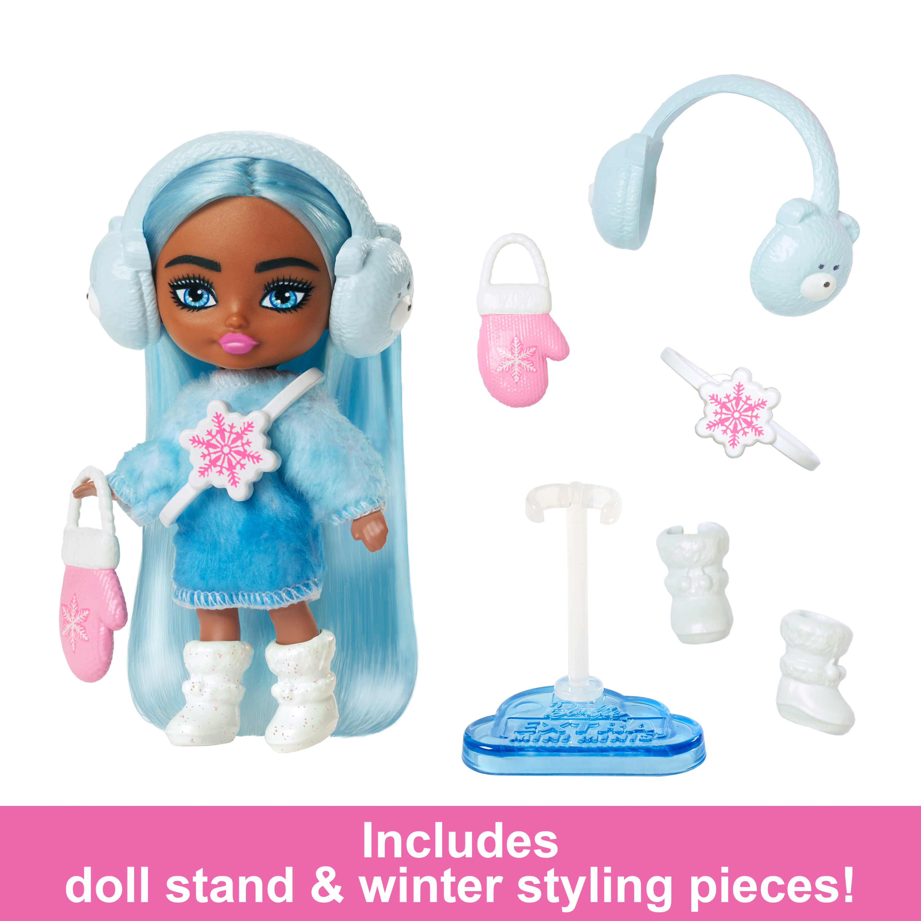 Eine Barbie-Puppe mit blauen Haaren, Ohrenschützern und Winteraccessoires. Inklusive Ständer und Styling-Teile.