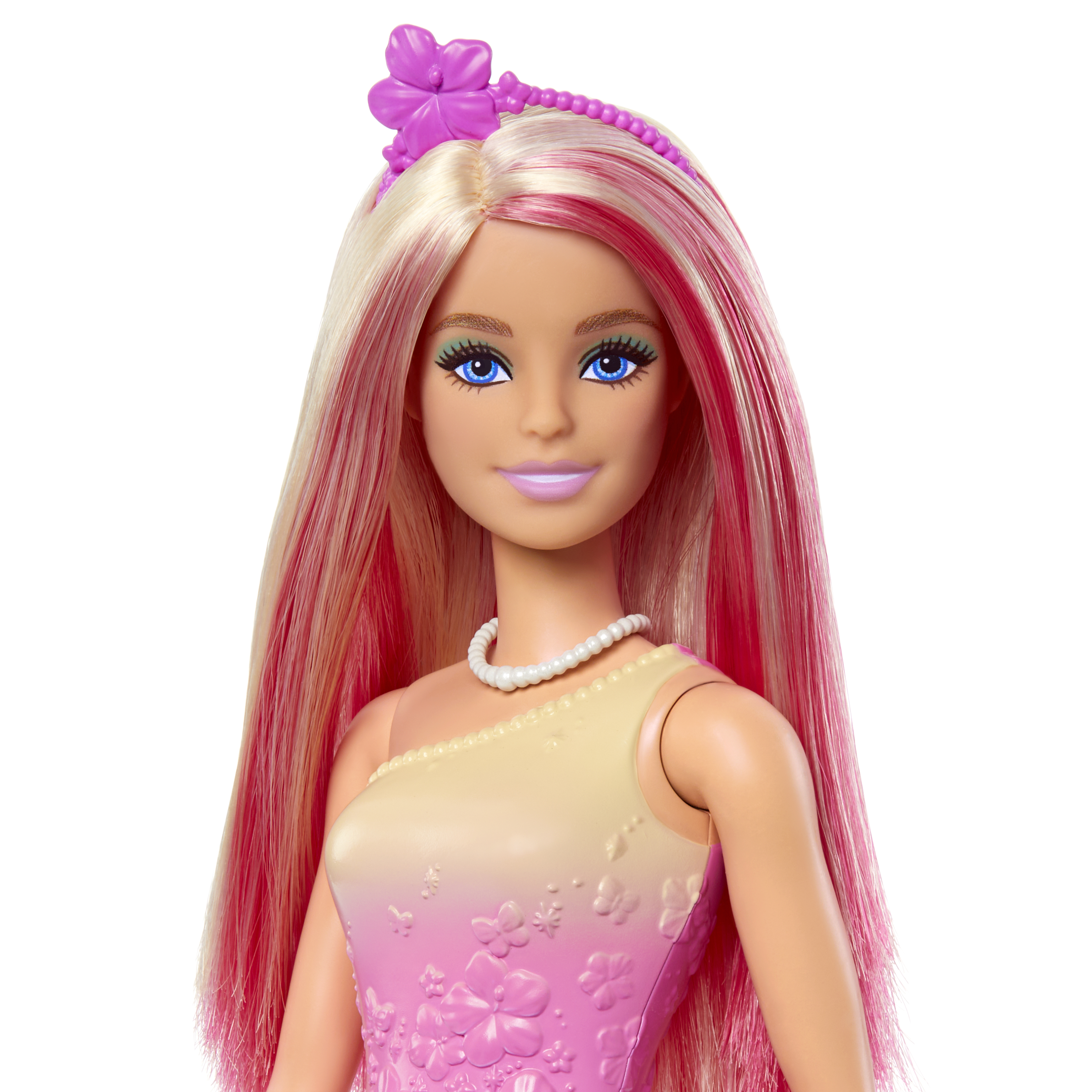 Muñeca Barbie con pelo largo. Mechones rosas y blancos. Tocado floral. Fondo blanco.