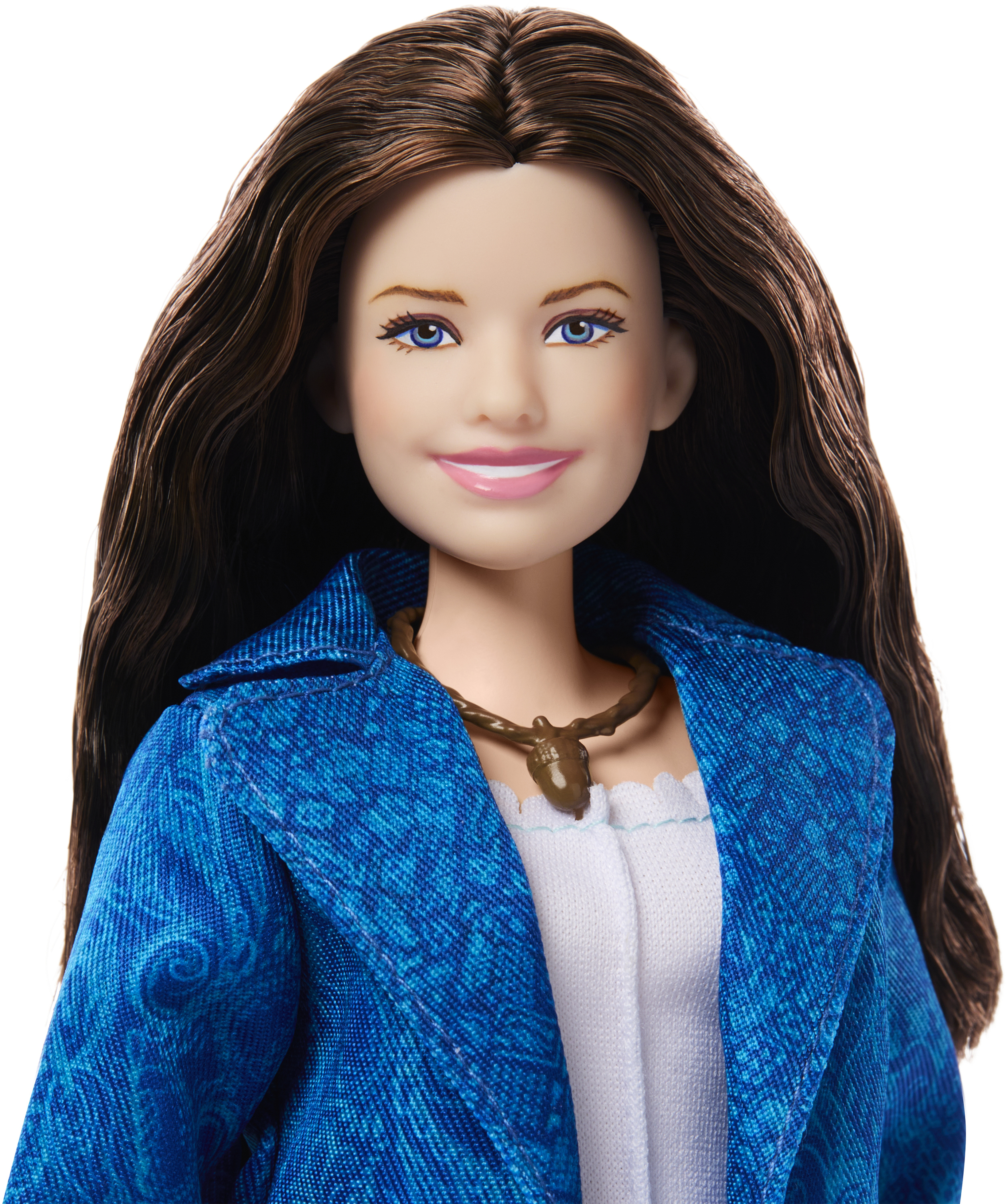 Barbie-Puppe Gesicht Nahaufnahme. Lange, braune Haare, blaue Augen, trägt eine blaue Jacke.