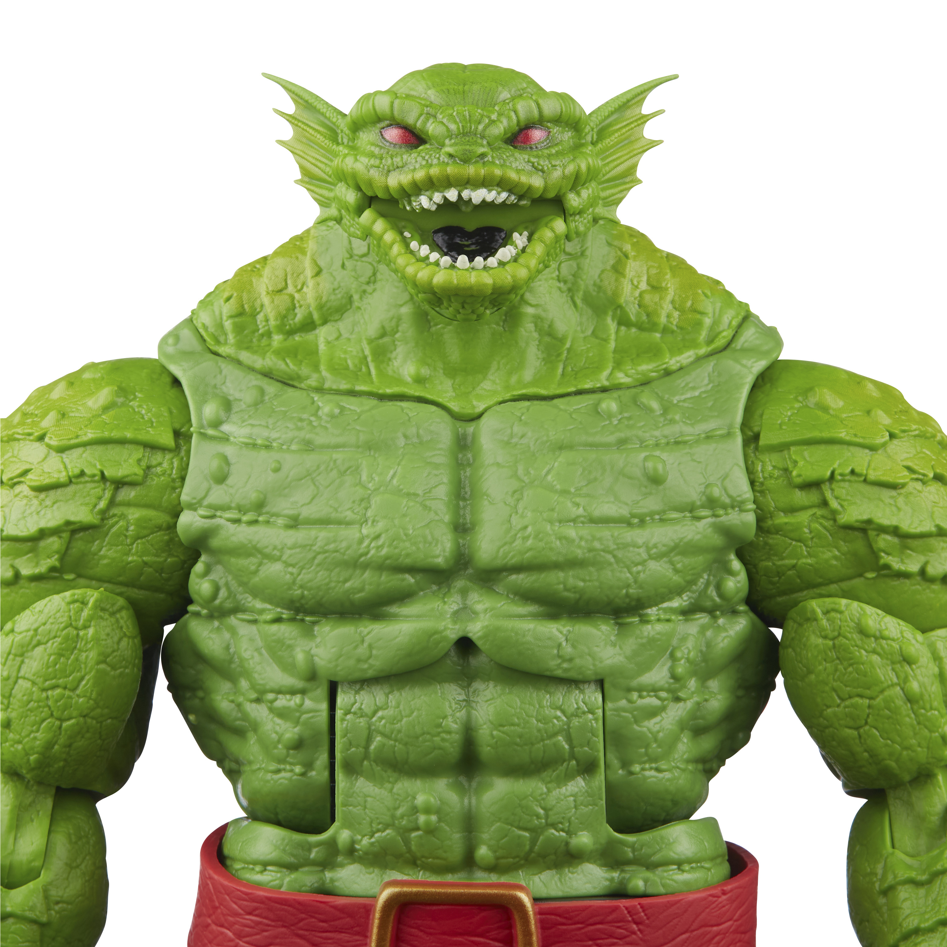Zielona figurka z dużą głową, czerwonymi oczami i umięśnionym ciałem.