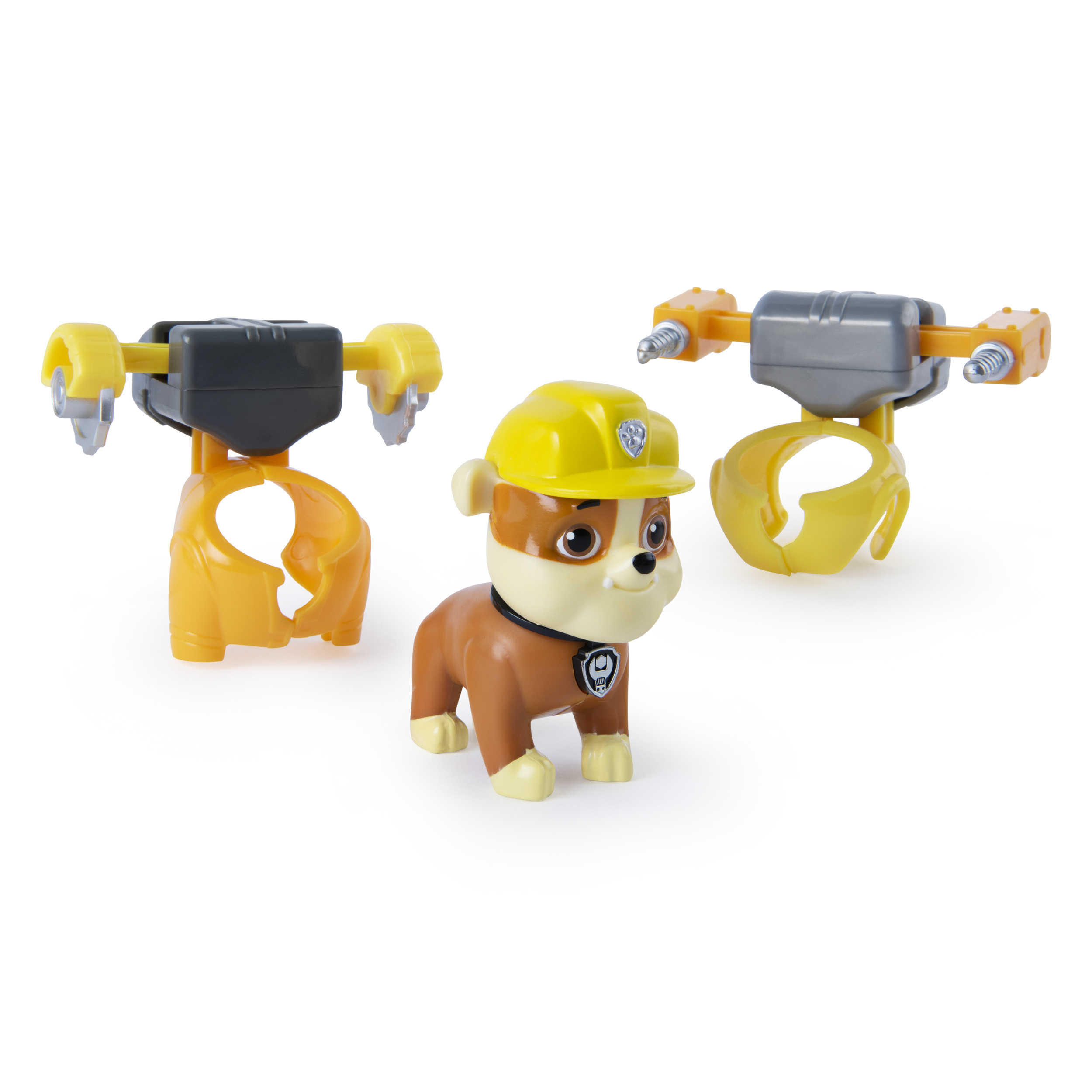 Juego de juguetes de Paw Patrol con un perro y accesorios de construcción. Fondo blanco.