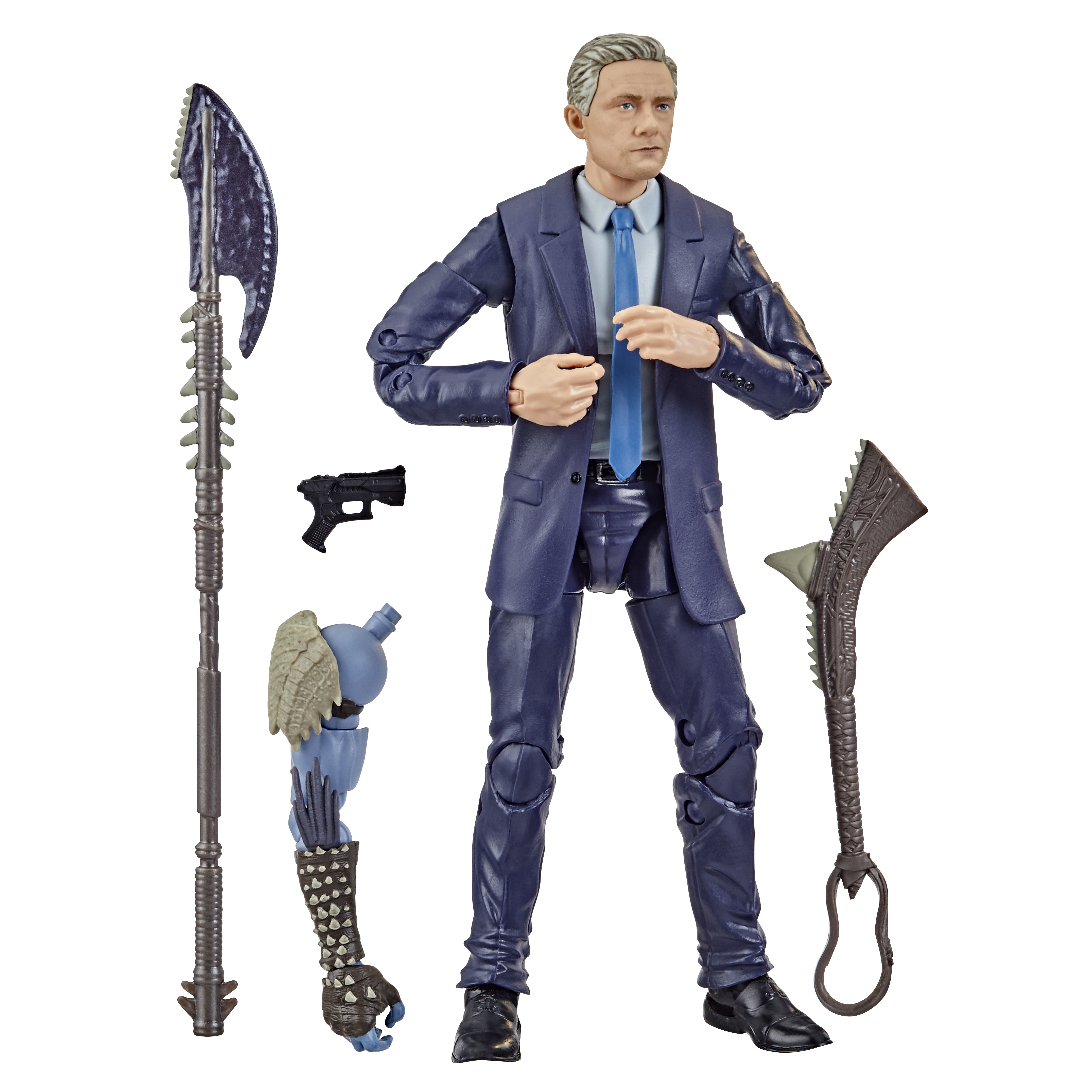 Action figure di un uomo in giacca e cravatta con armi e un braccio robotico.