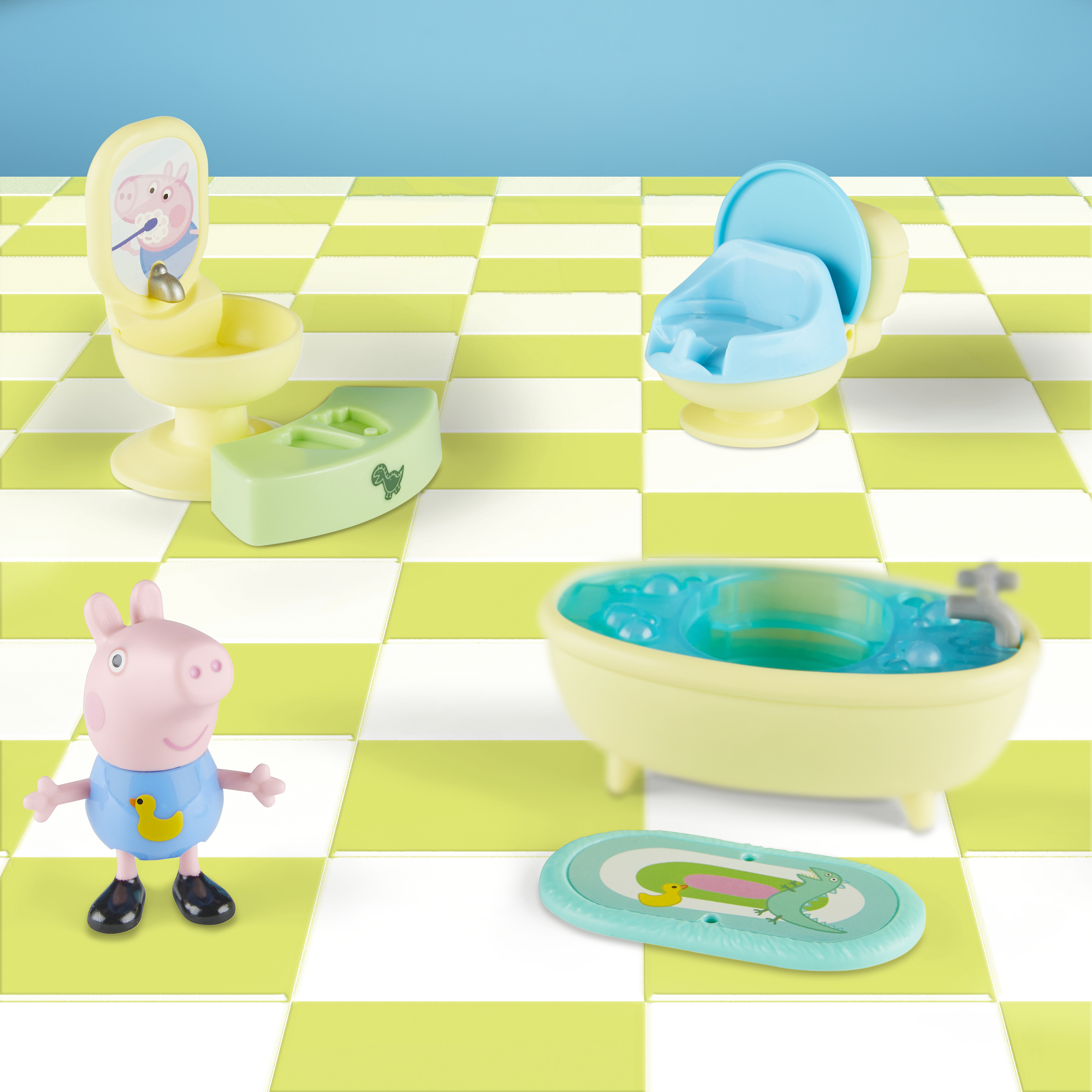 Set di giocattoli di Peppa Pig con Peppa, una toilette, una vasca da bagno e altri accessori.