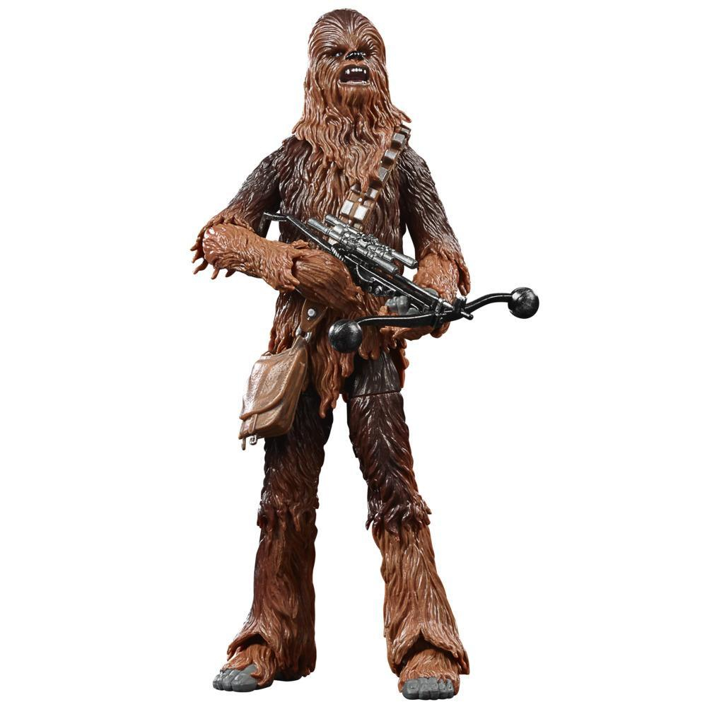 Action figure di Chewbacca con una balestra su sfondo nero, da Star Wars.