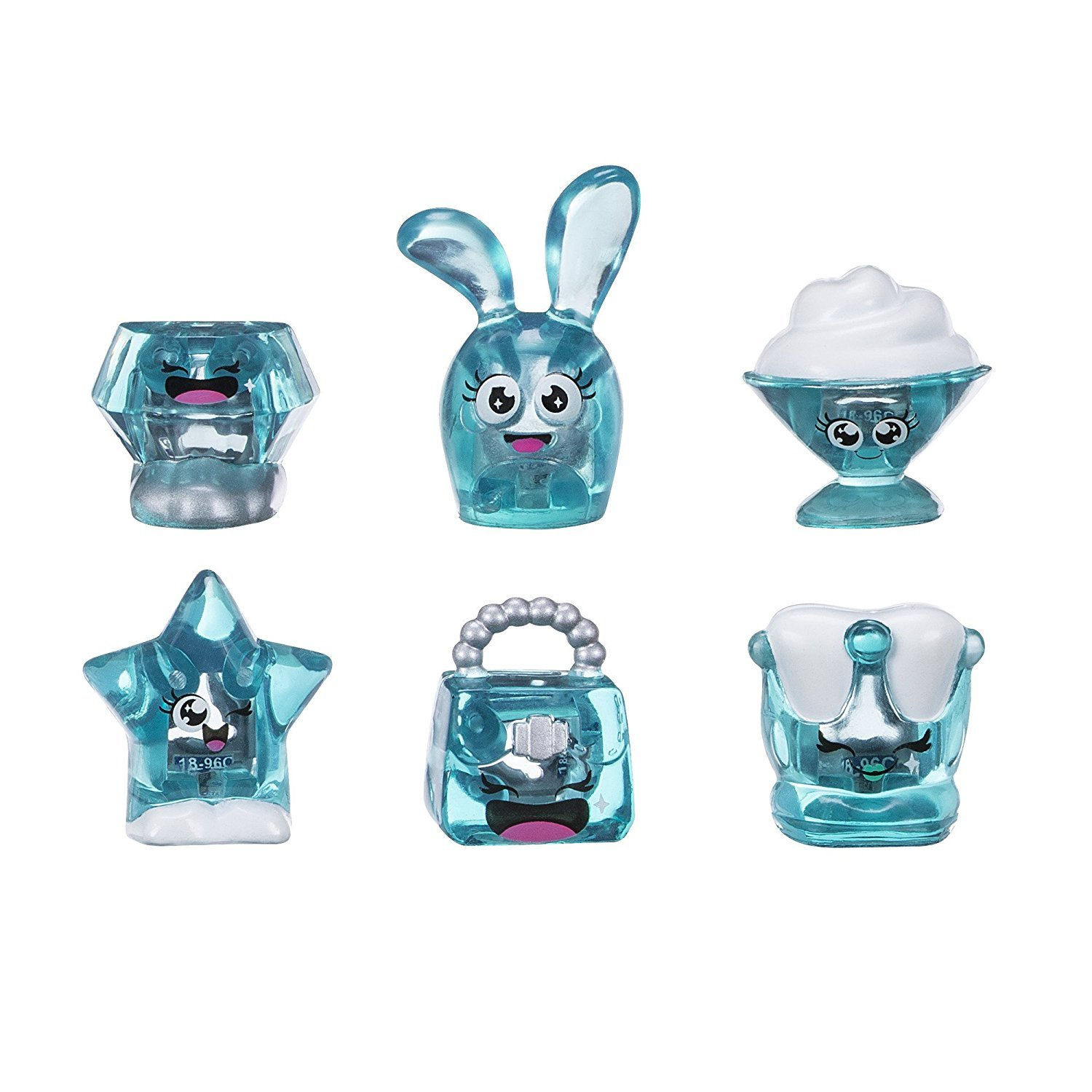 Sei giocattoli traslucidi: diamante, coniglio, gelato, stella, borsa e tiara. Sfondo bianco.