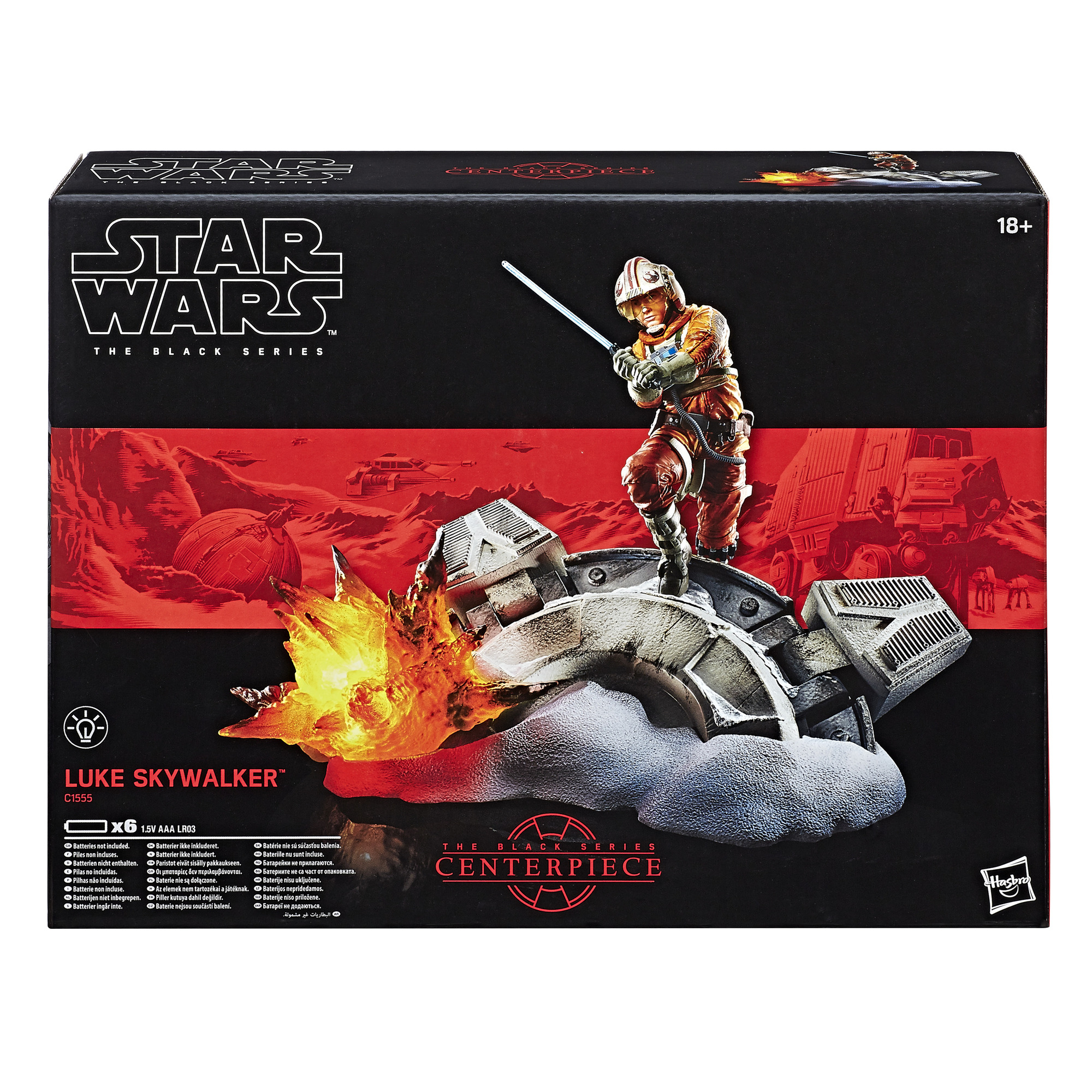 Star Wars Box-Set. Luke Skywalker Figur mit Lichtschwert auf schneebedeckter Basis mit feuriger Explosion.