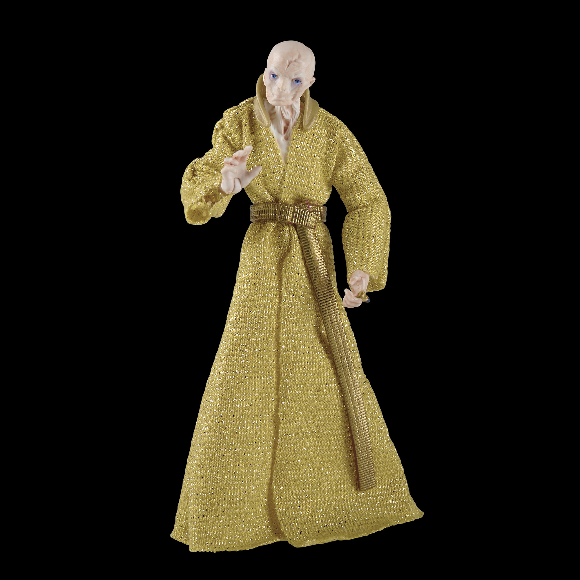 Eine goldgewandete Figur mit blassem Gesicht und ausgestreckter Hand, auf schwarzem Hintergrund.
