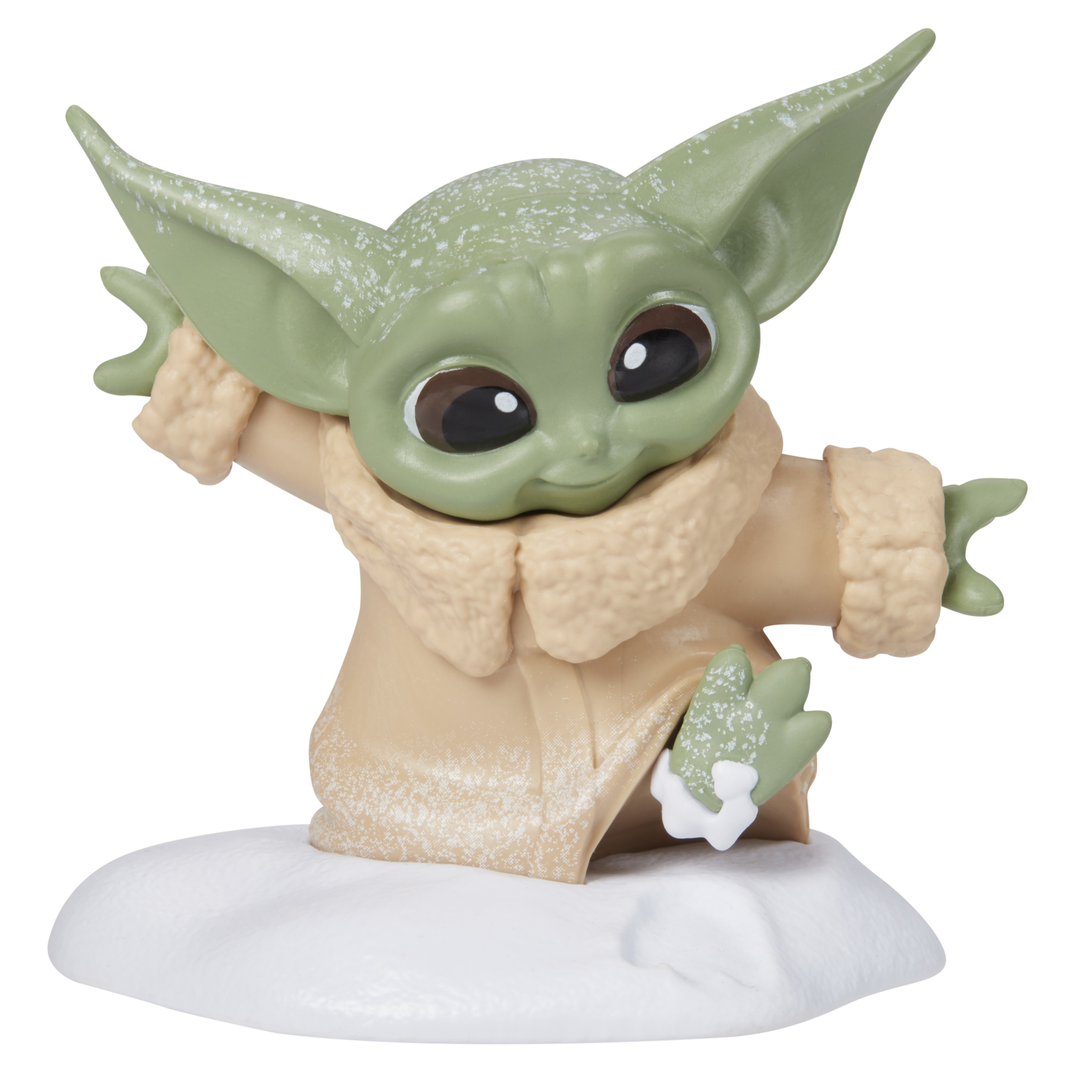 Figura di Baby Yoda con neve su una base bianca. Lo sfondo è bianco.