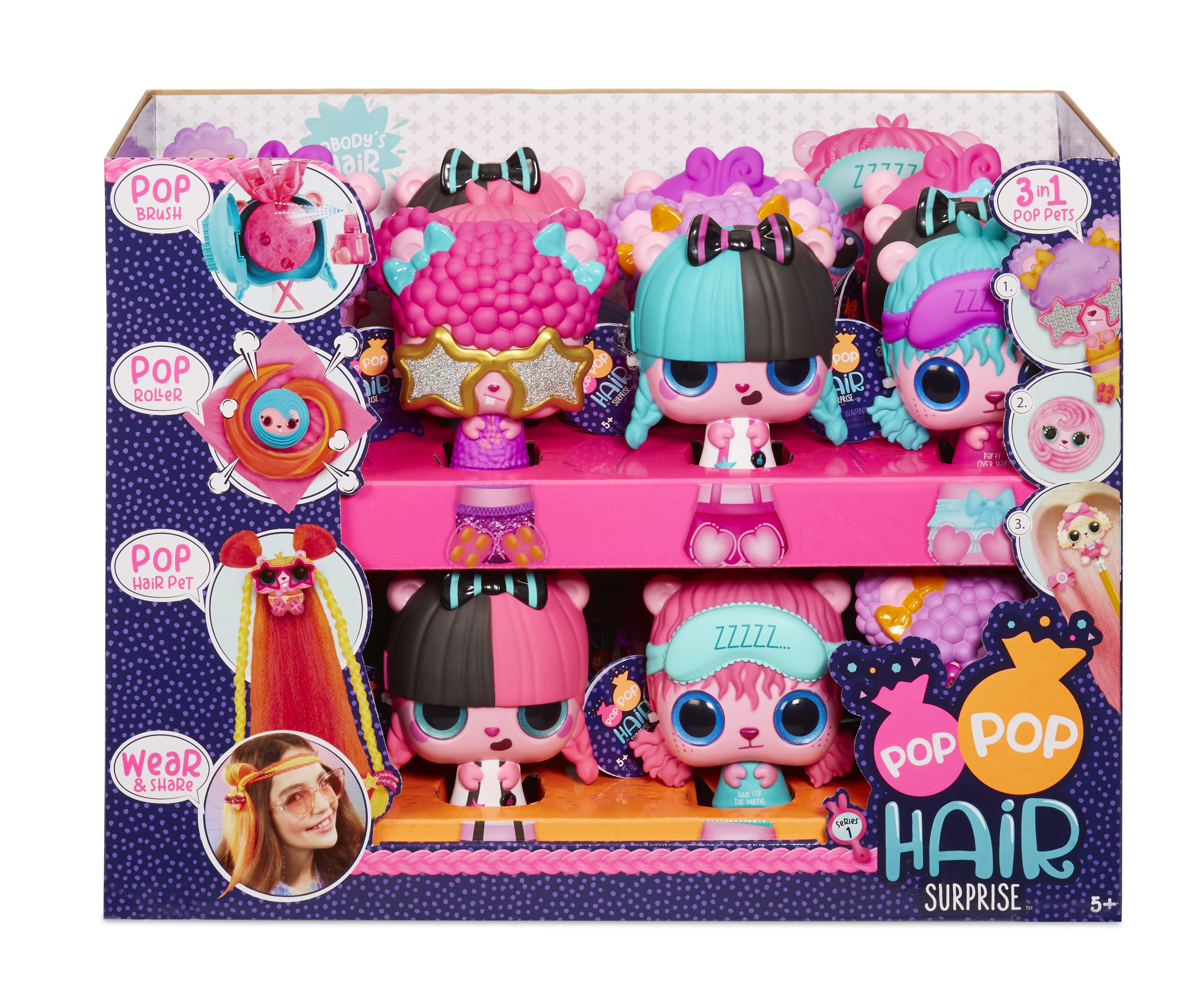 Box mit Pop Pop Hair Surprise Puppen, mit verschiedenen Puppen mit unterschiedlichen Frisuren und Accessoires.