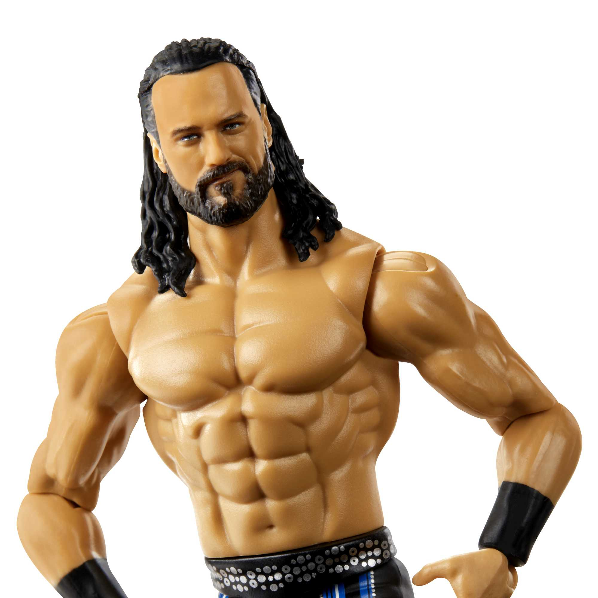 Actionfigur eines muskulösen Mannes mit langen schwarzen Haaren und schwarzen Armbändern.