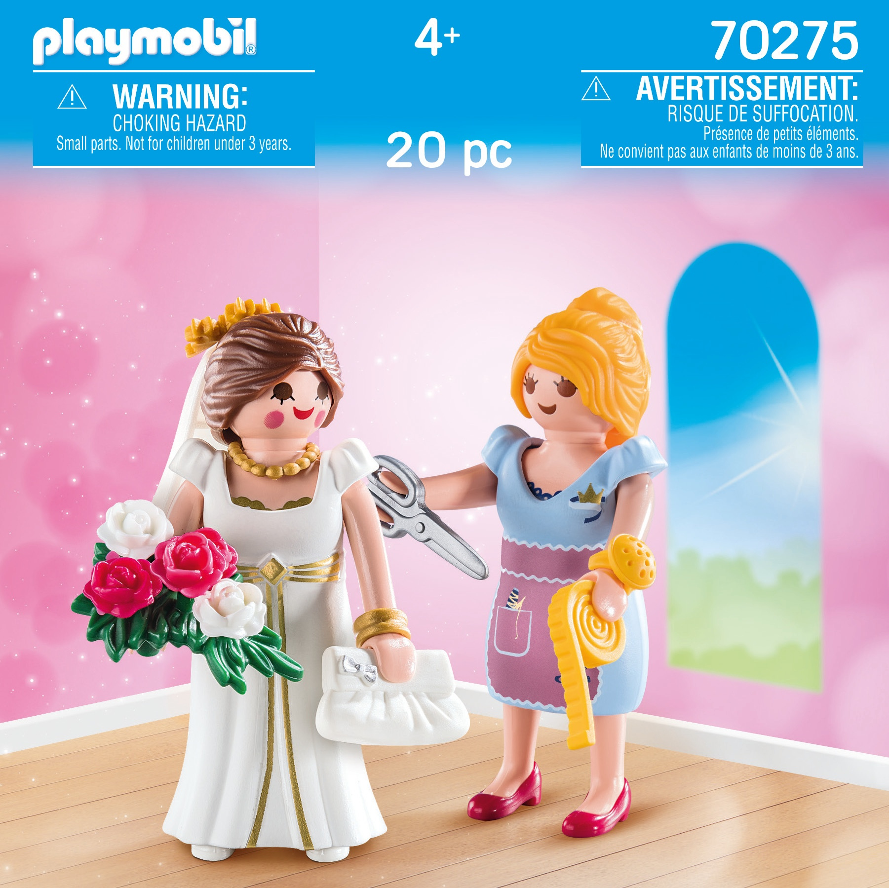 Zwei Playmobil-Figuren. Eine Braut in einem weißen Kleid und eine Brautjungfer mit einem Blumenstrauß und einer Schere.