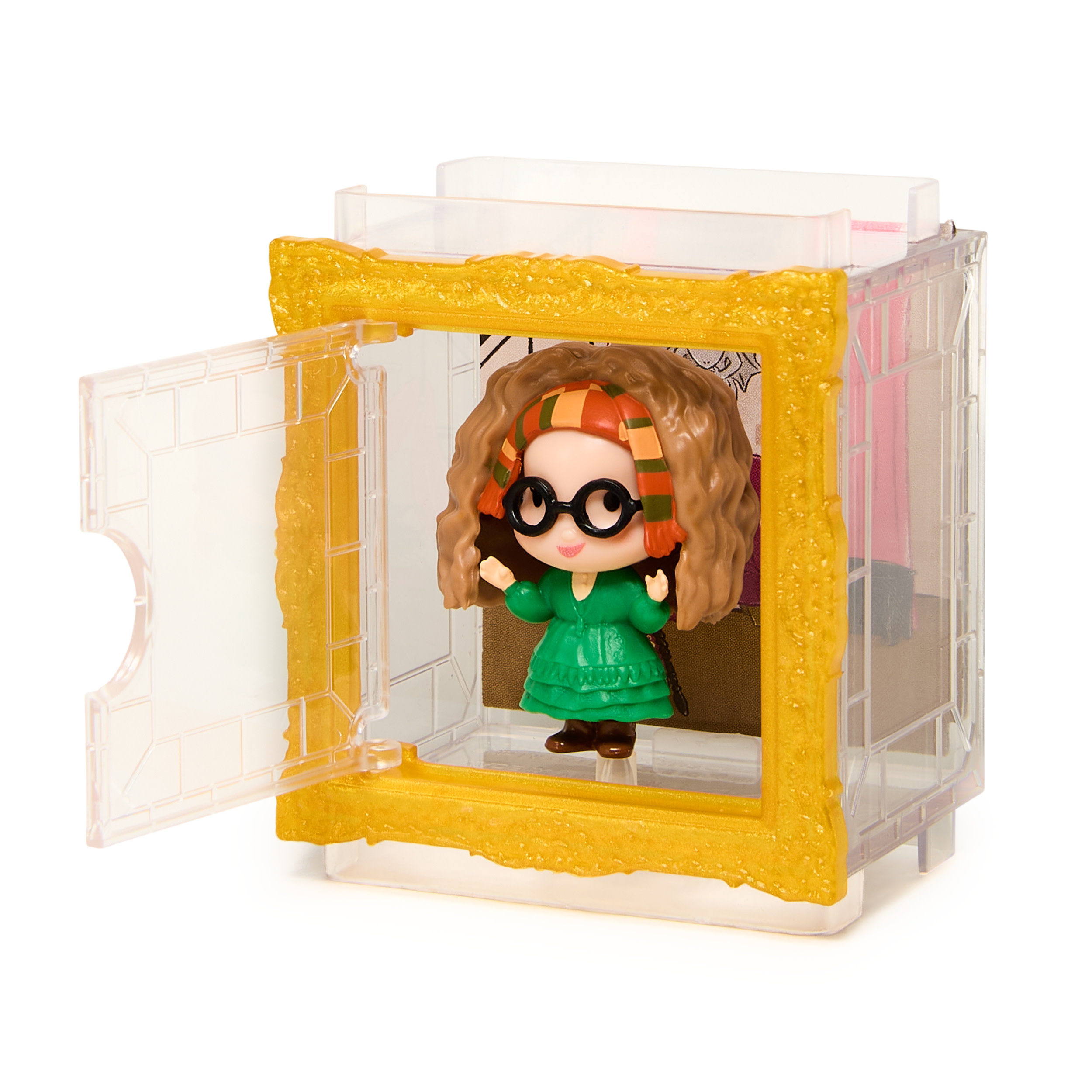 Un juguete de Harry Potter en una caja de plástico abierta con un marco amarillo. Una muñeca es visible dentro.