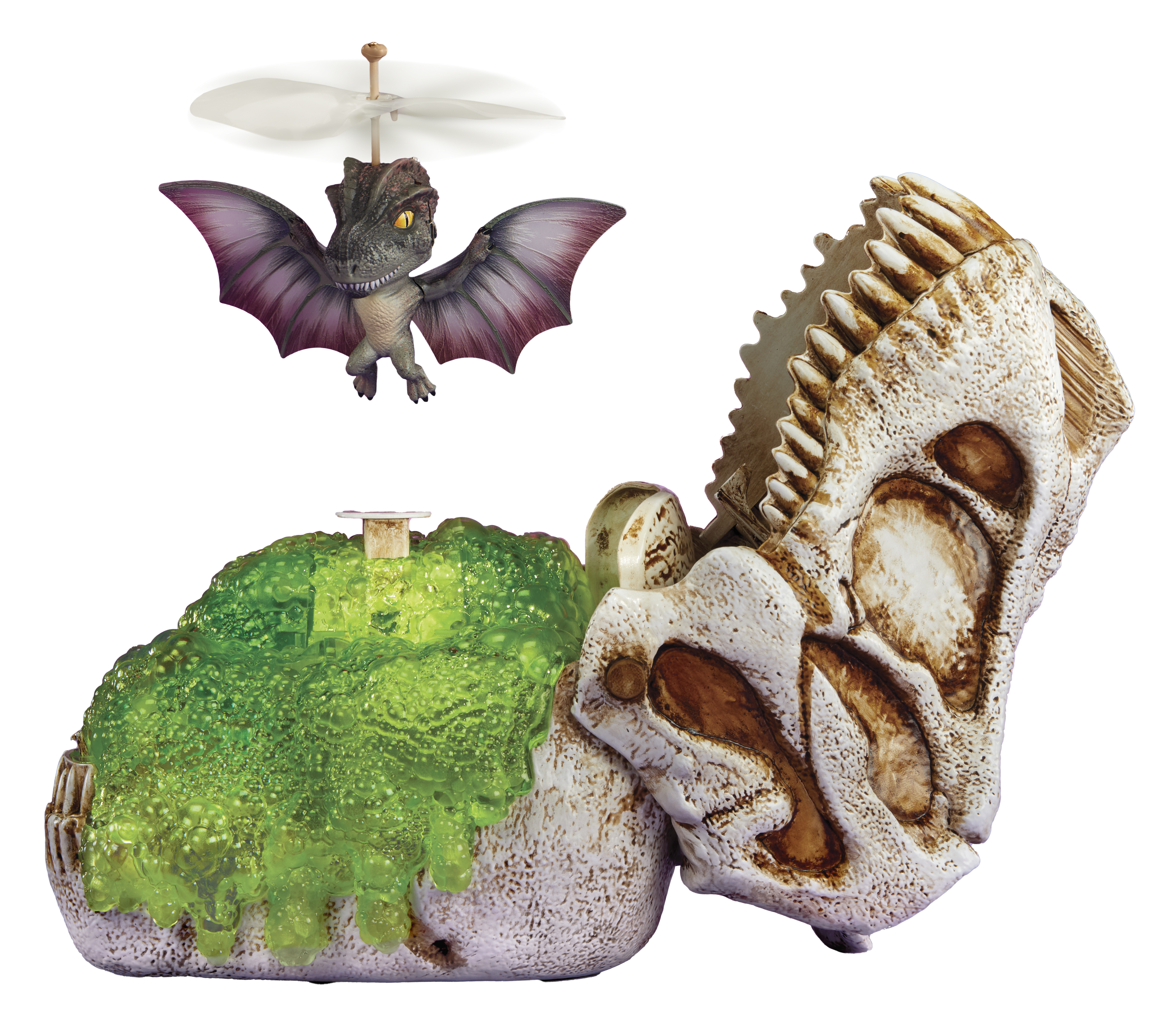 Cráneo de juguete de dinosaurio con limo verde y un juguete de dino volador.