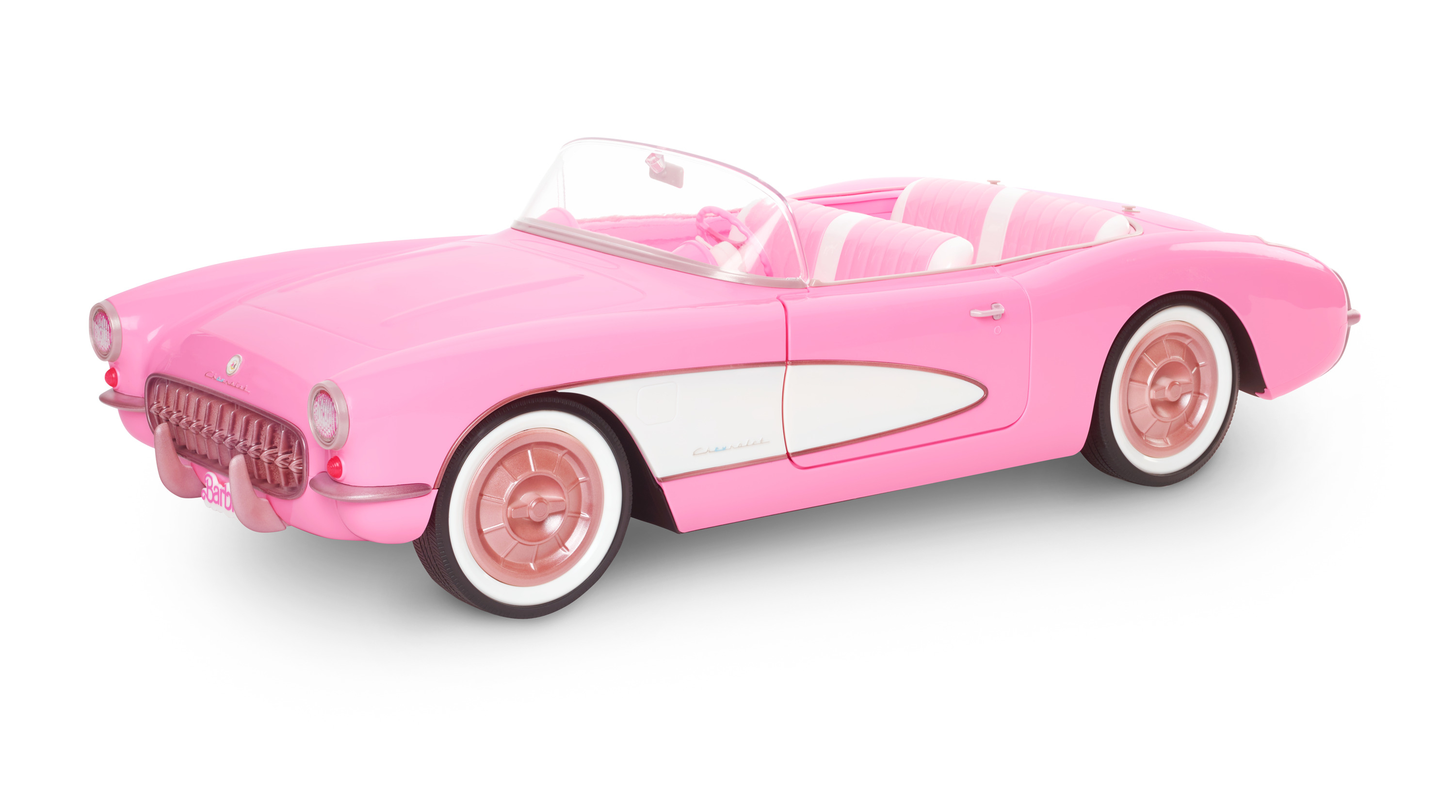 Różowy klasyczny samochód z białymi akcentami, białymi kołami i białym tłem.