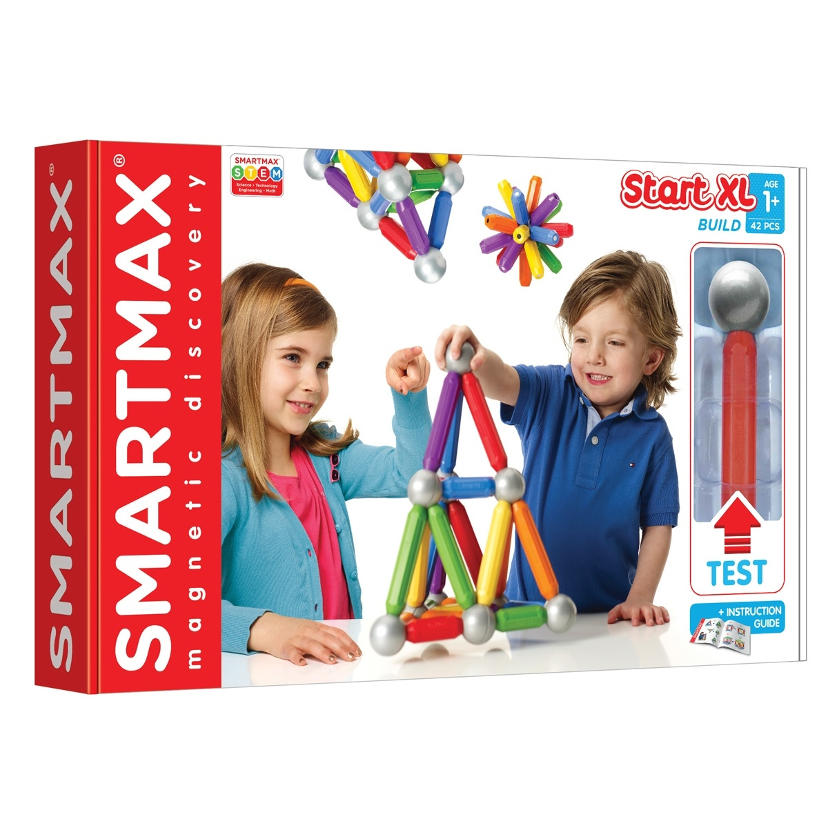 Due bambini giocano con giocattoli di costruzione magnetici colorati in una scatola, su un tavolo.
